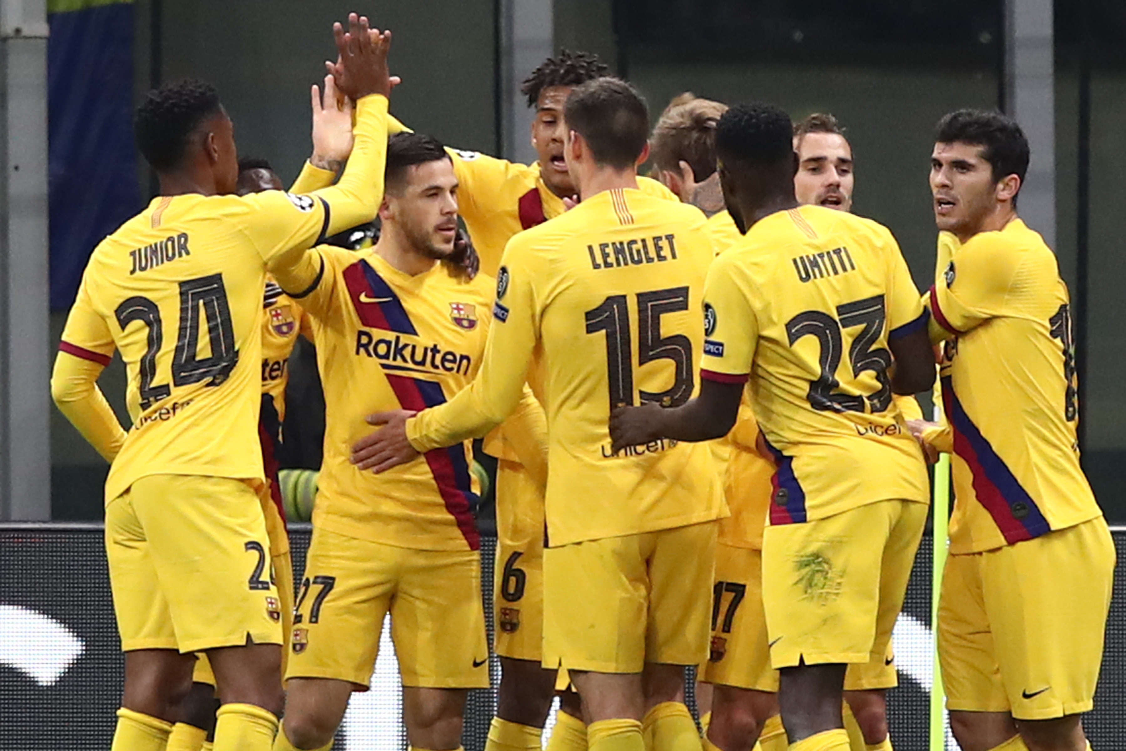 Barcelona players celebrate Carles Perez's goal against Inter.