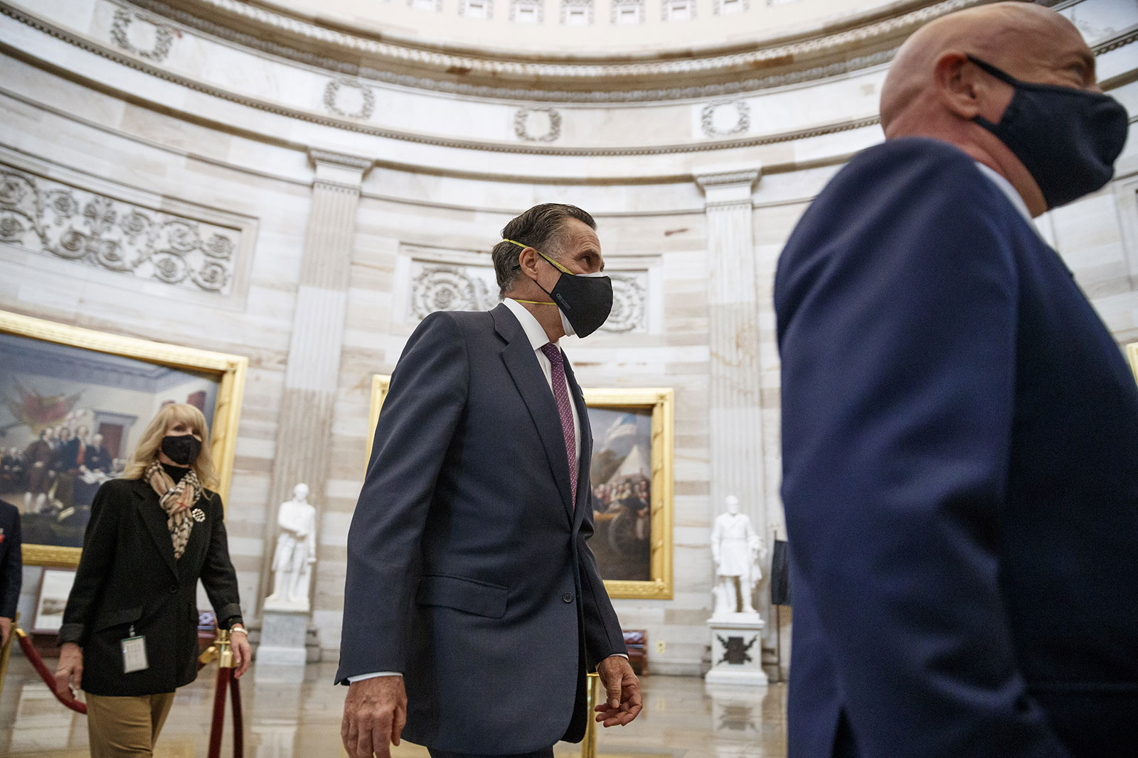 Sen. Mitt Romney walks though the US Capitol on Wednesday, January 6. 