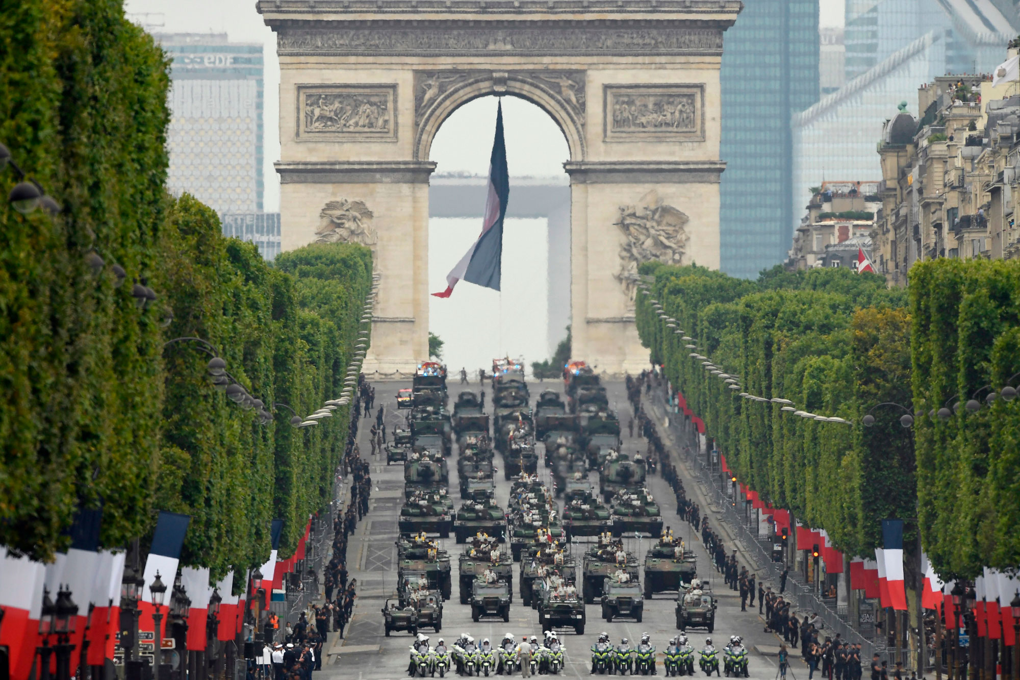 French soldiers parade in military vehicles during the Bastille Day military parade down the Champs-Elysees avenue in Paris on July 14, 2019. 