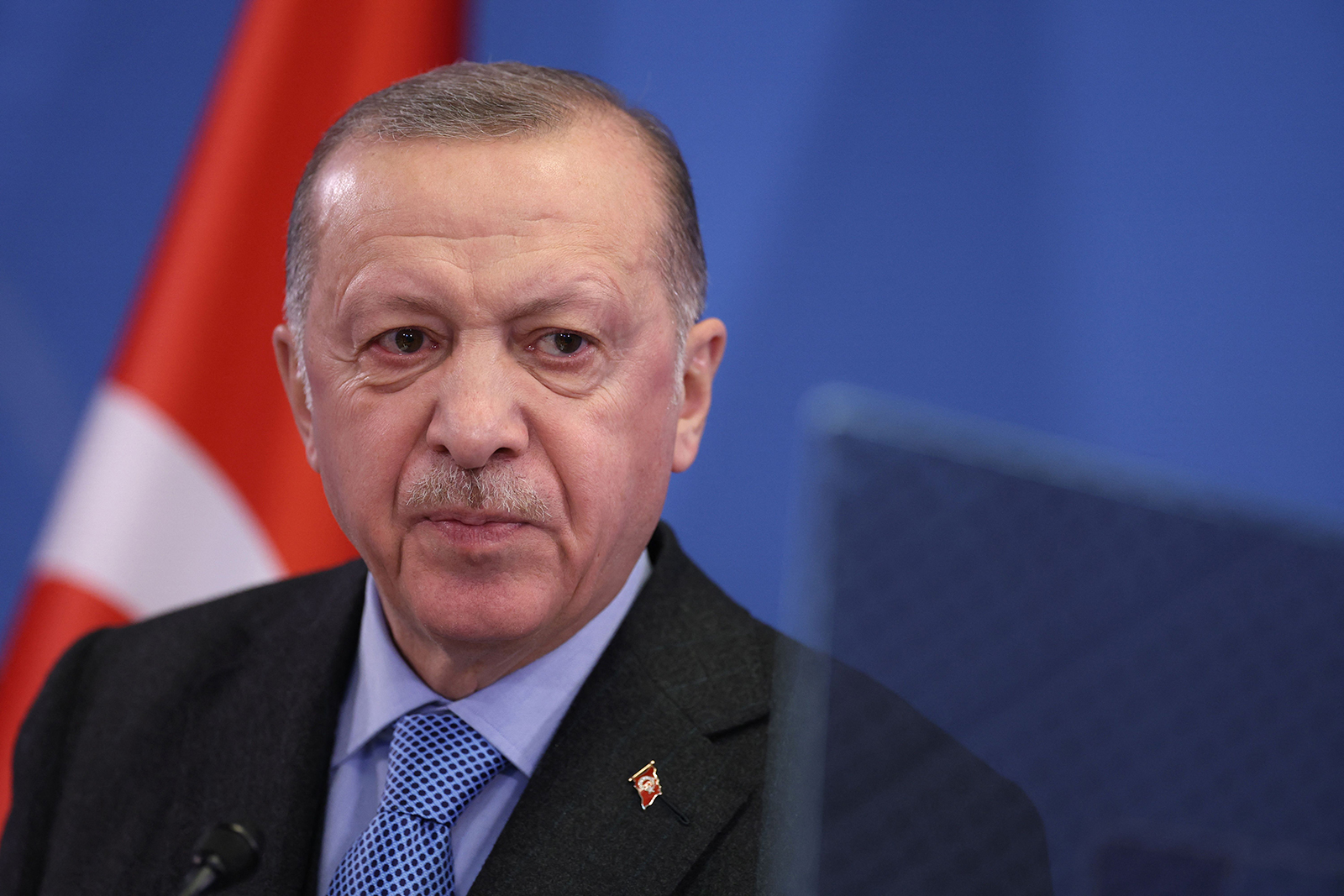Turkey's President Recep Tayyip Erdogan addresses media representatives during a press conference at a European Union summit at EU Headquarters in Brussels on March 24.