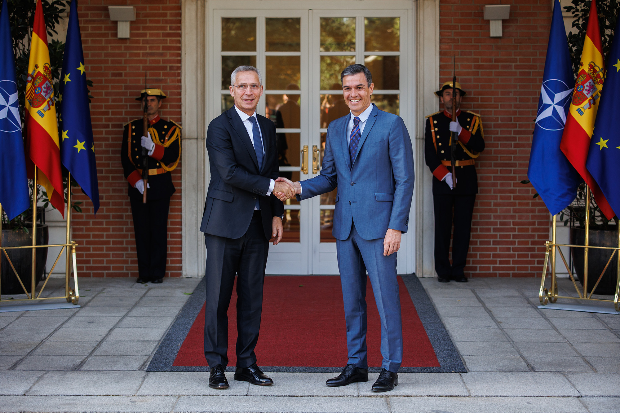 Spanish President Pedro Sanchez (right), receives NATO Secretary General Jens Stoltenberg at the Moncloa Palace in Madrid, Spain, on May 30.