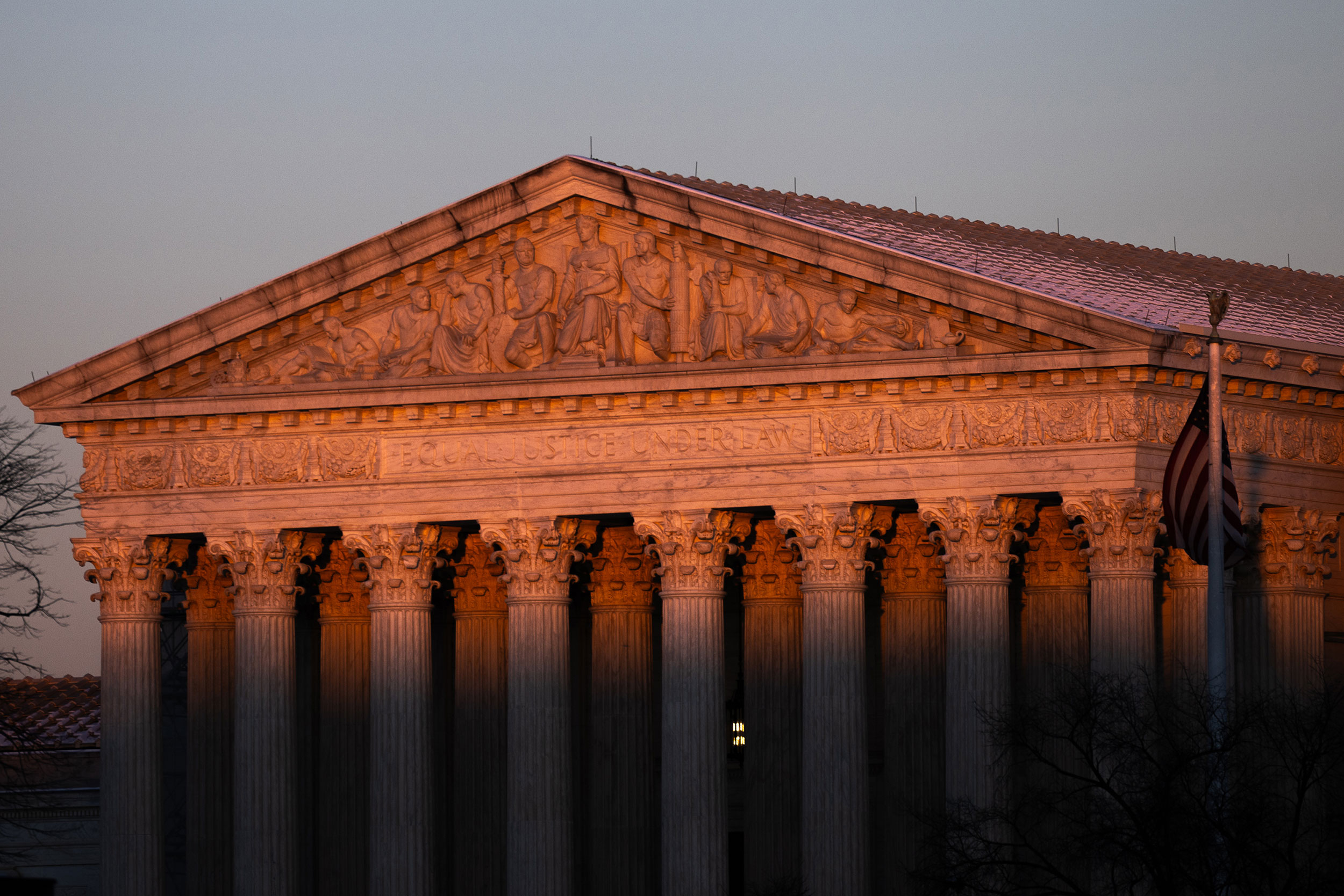 The sun illuminates the Supreme Court in Washington, DC, on January 17.