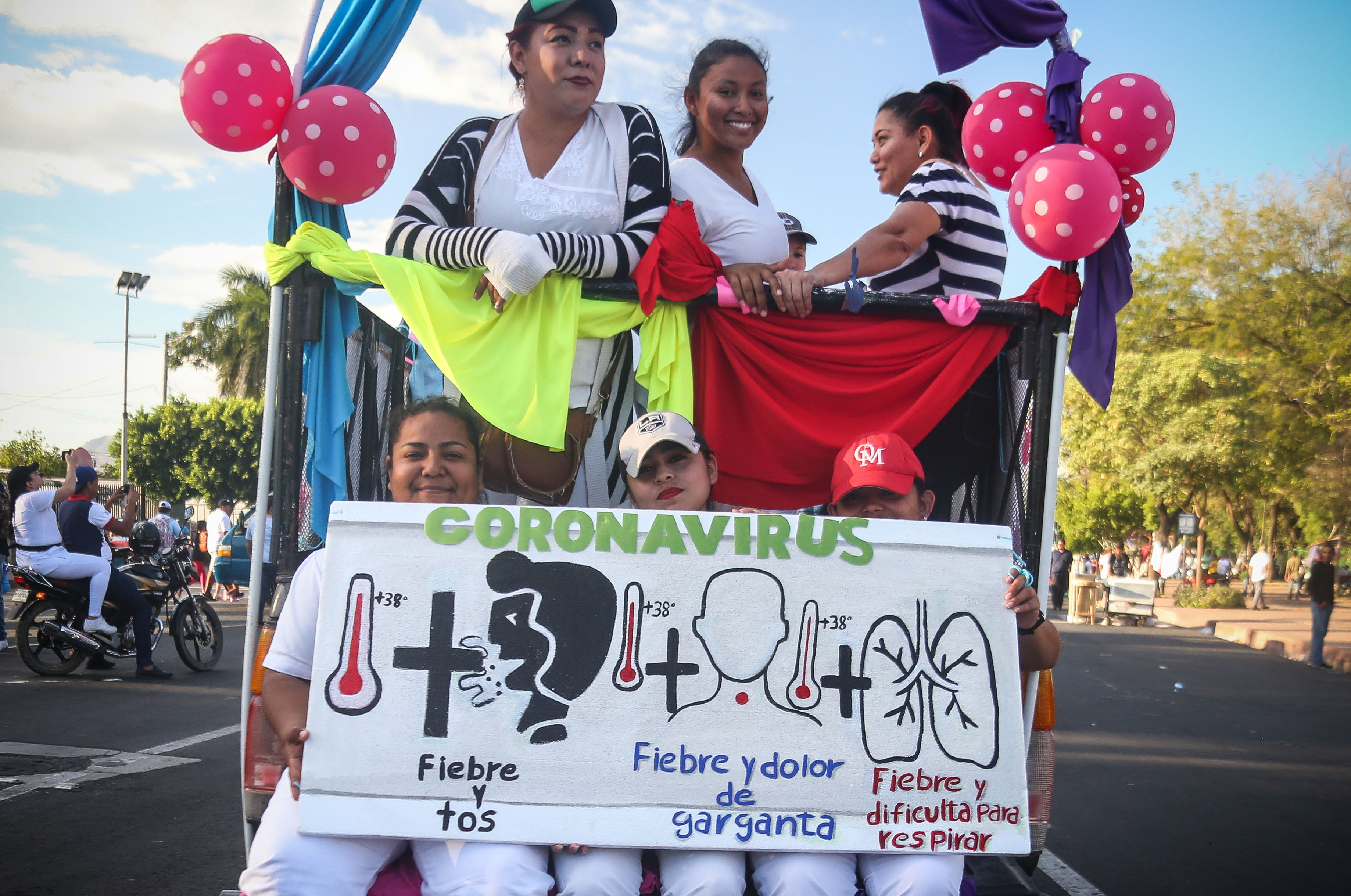 Supporters of Nicaraguan President Daniel Ortega take part in a demonstration called 'Love in times of COVID-19', in Managua on March 14, 2020.