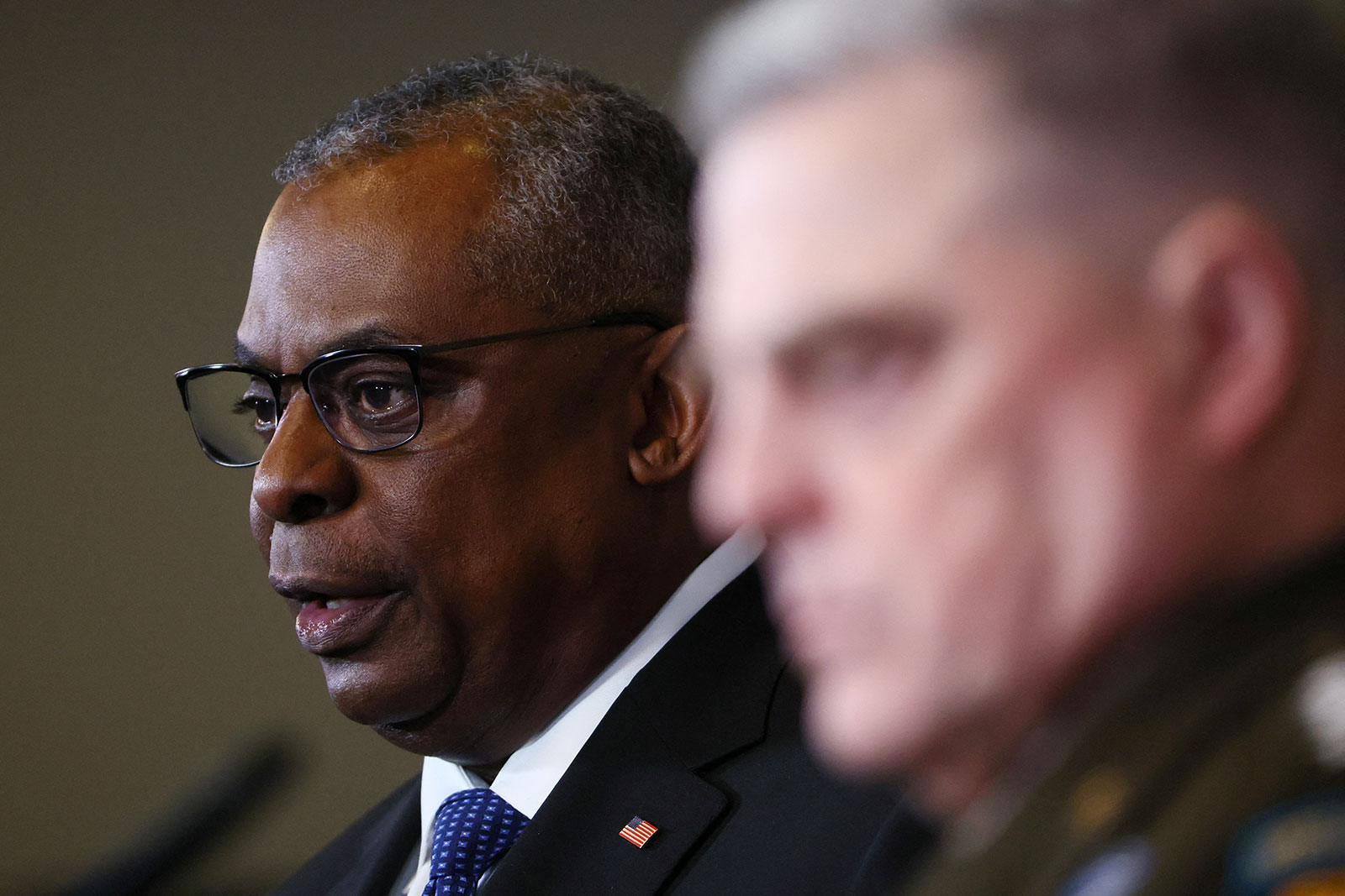 US Defense Secretary Lloyd Austin addresses a news conference with US Chairman of the Joint Chiefs of Staff Gen. Mark A. Milley at Ramstein Air Base in Germany on Friday. 