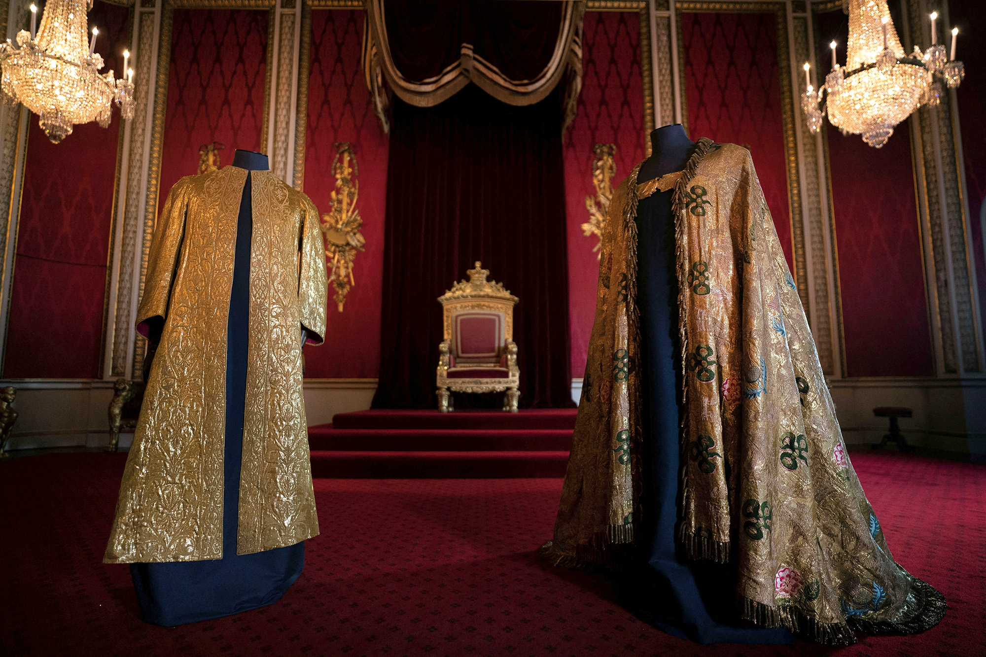 The Coronation Vestments, comprising of the Supertunica and the Imperial Mantle, which will be worn by Britain's King Charles III during his coronation, displayed in the Throne Room at Buckingham Palace, London, on April 26.
