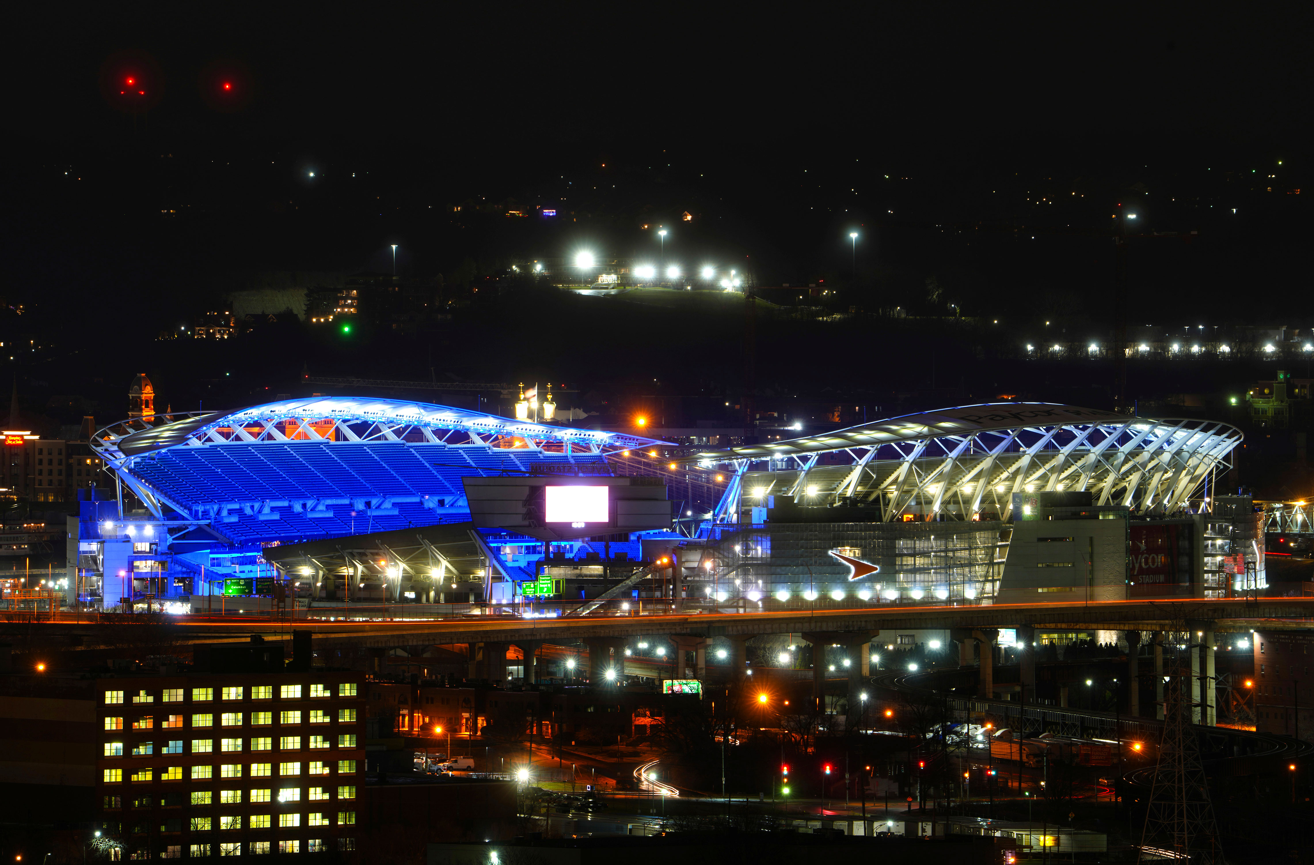 Paycor Stadium, home of the Cincinnati Bengals, is lit with Buffalo Bills colors in support of Damar Hamlin on January 3 in downtown Cincinnati. 
