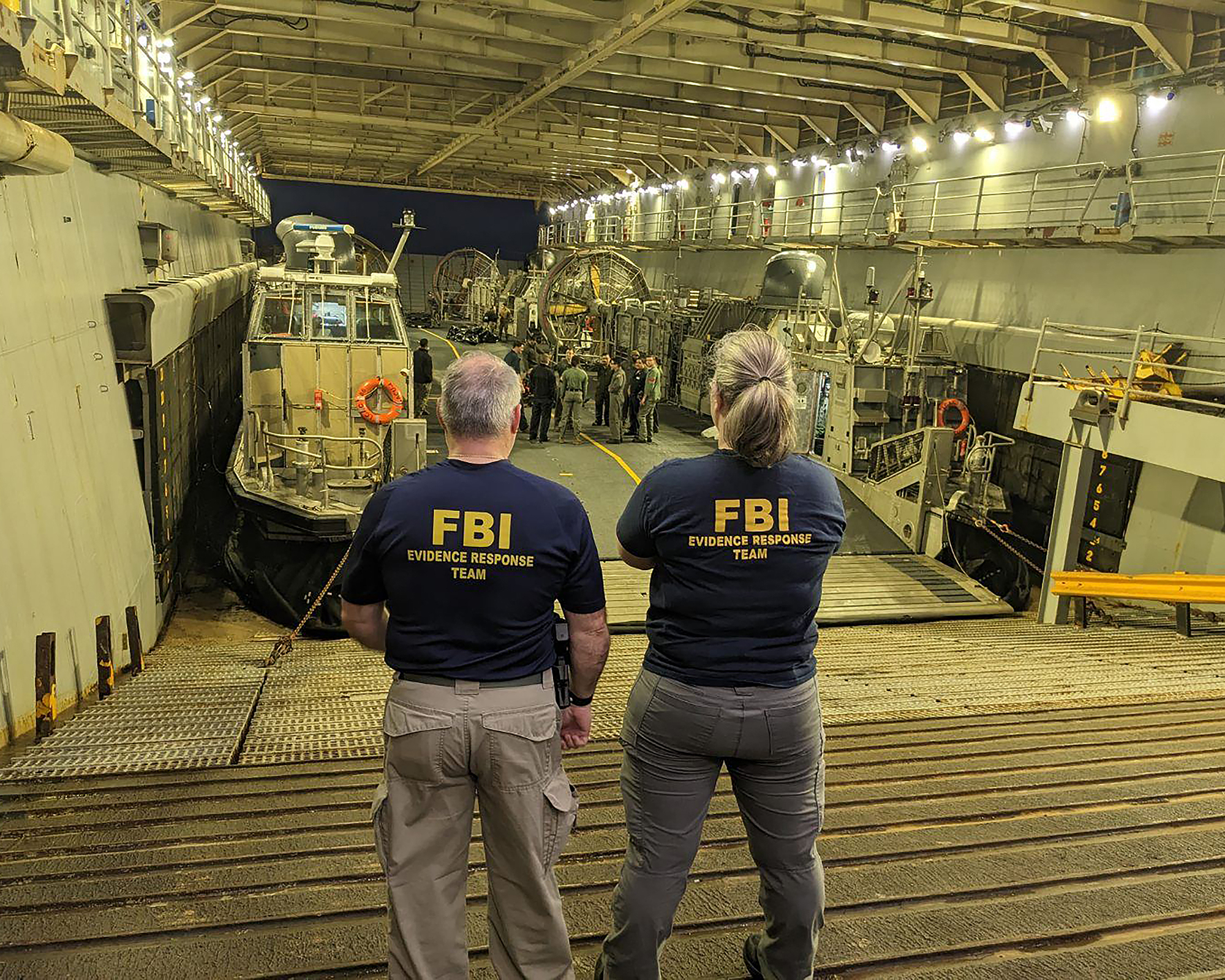 FBI Evidence Response Team Members aboard a Department of Defense vessel assigned to recover efforts off the coast of South Carolina.