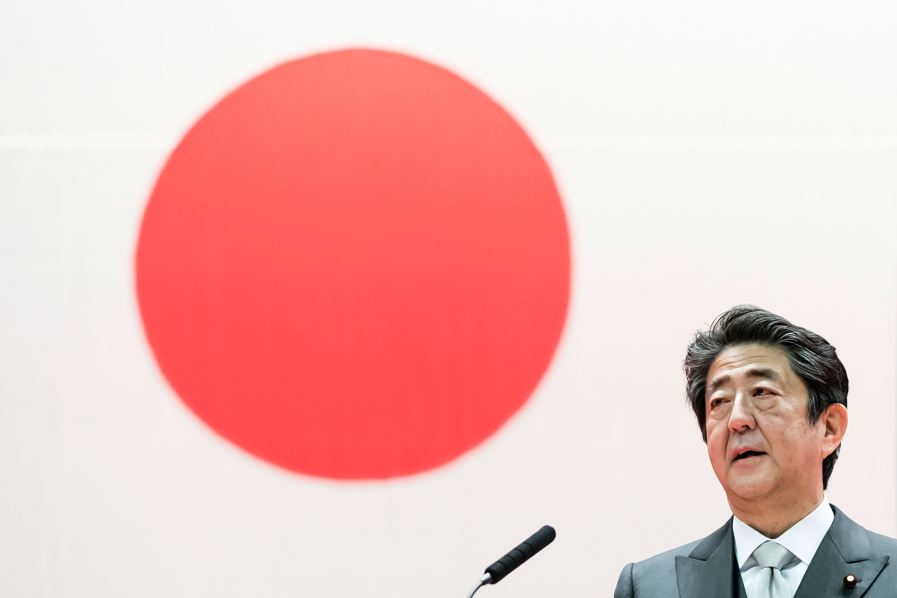 Japan's Prime Minister Shinzo Abe speaks during the graduation ceremony of the National Defense Academy on March 22, 2020 in Yokosuka, Japan.