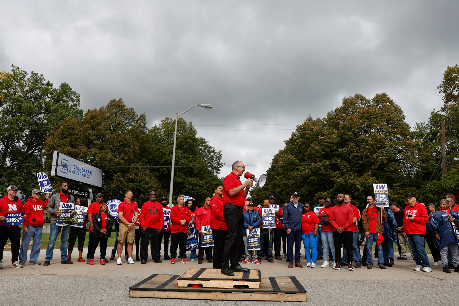Shawn Fain, President of the United Auto Workers (UAW) speaks as U.S. President Joe Biden joins striking members of the United Auto Workers (UAW) on the picket line outside the GM's Willow Run Distribution Center, in Bellville, Wayne County, Michigan, today.