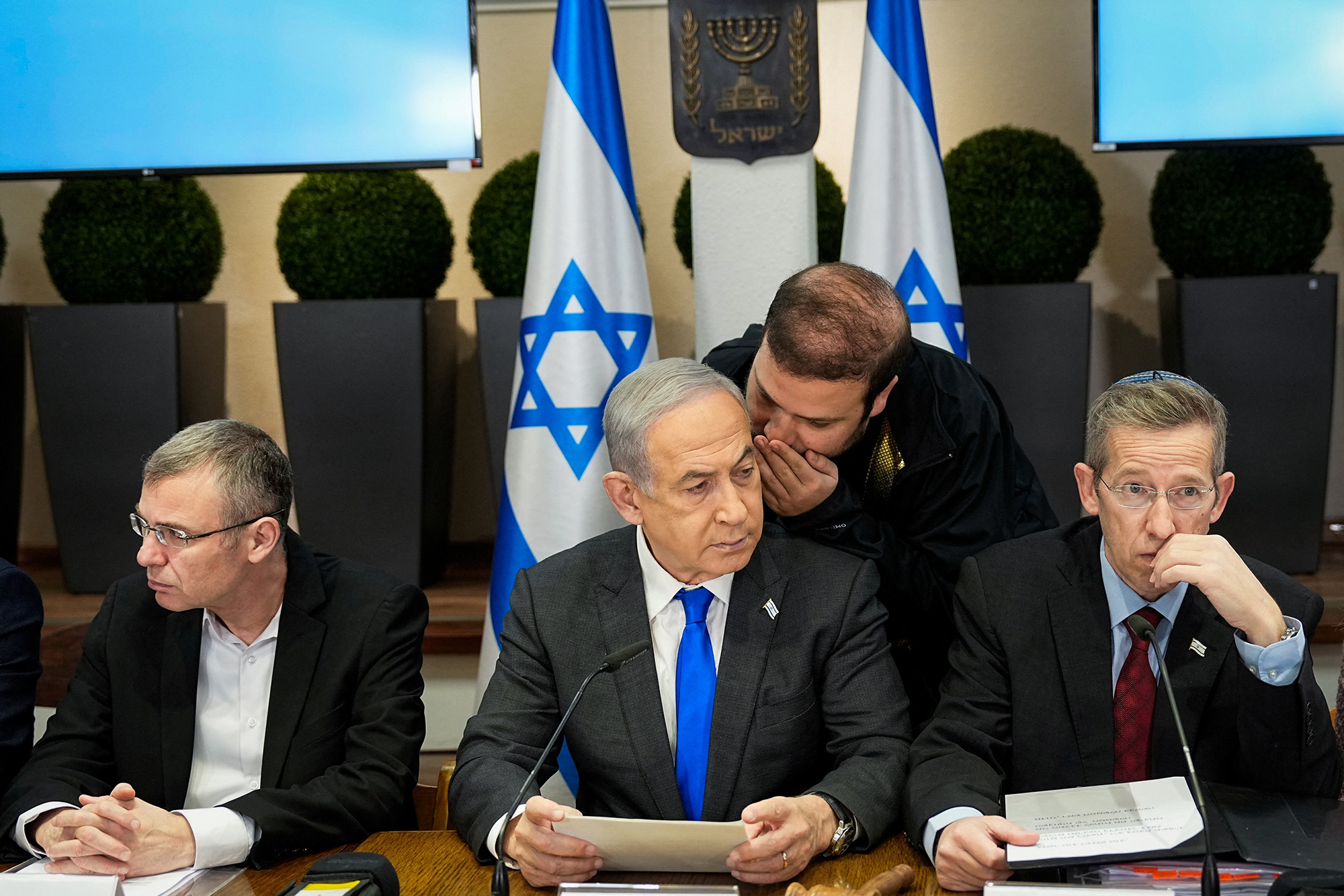 Israeli Prime Minister Benjamin Netanyahu, center, chairs a cabinet meeting at the Kirya military base in Tel Aviv, Israel, on December 24.