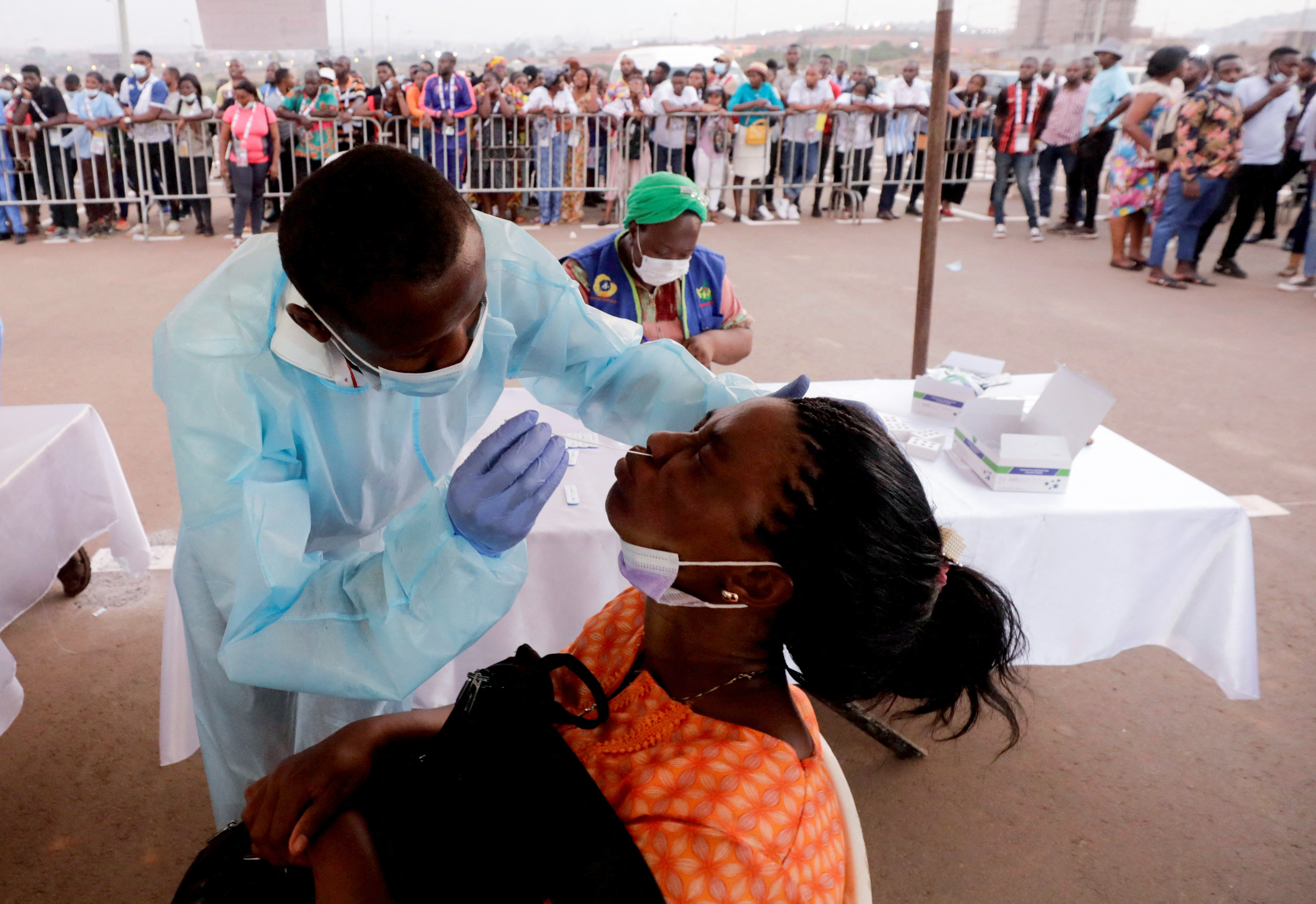 People receive a PCR test at the Olembe Stadium in Yaounde, Cameroon on Saturday. 
