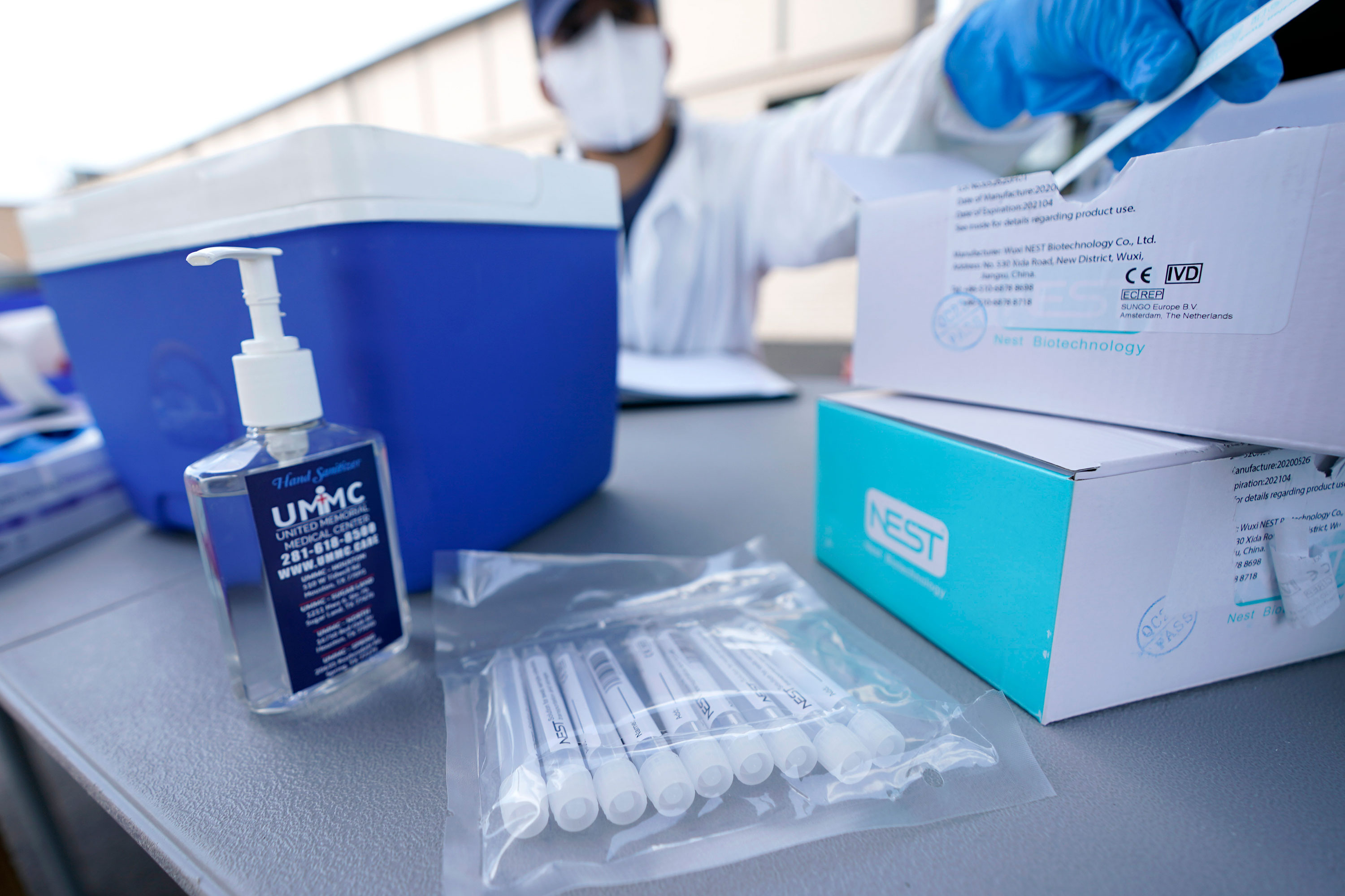 Covid-19 test kits sit on a table at a United Memorial Medical Center testing site on July 8 in Houston, Texas.