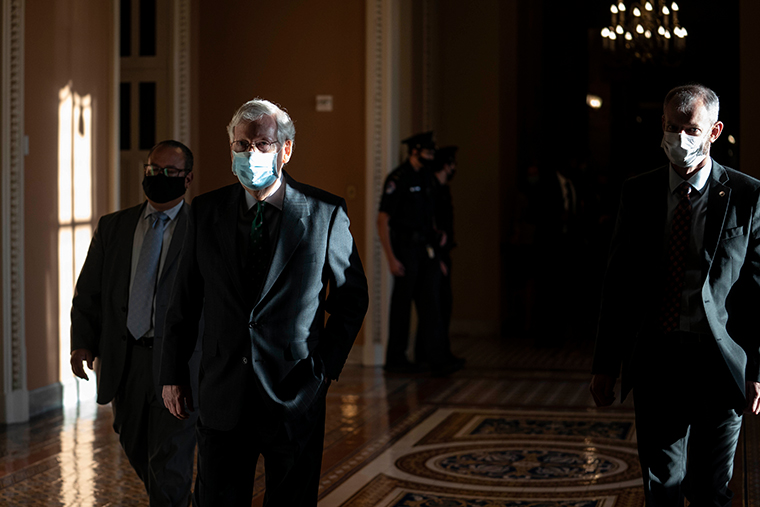 Senate Majority Leader Mitch McConnell walks from his office to the Senate floor following a meeting with Supreme Court Nominee Amy Coney Barrett at the U.S. Capitol on September 30, 2020 in Washington, DC. 