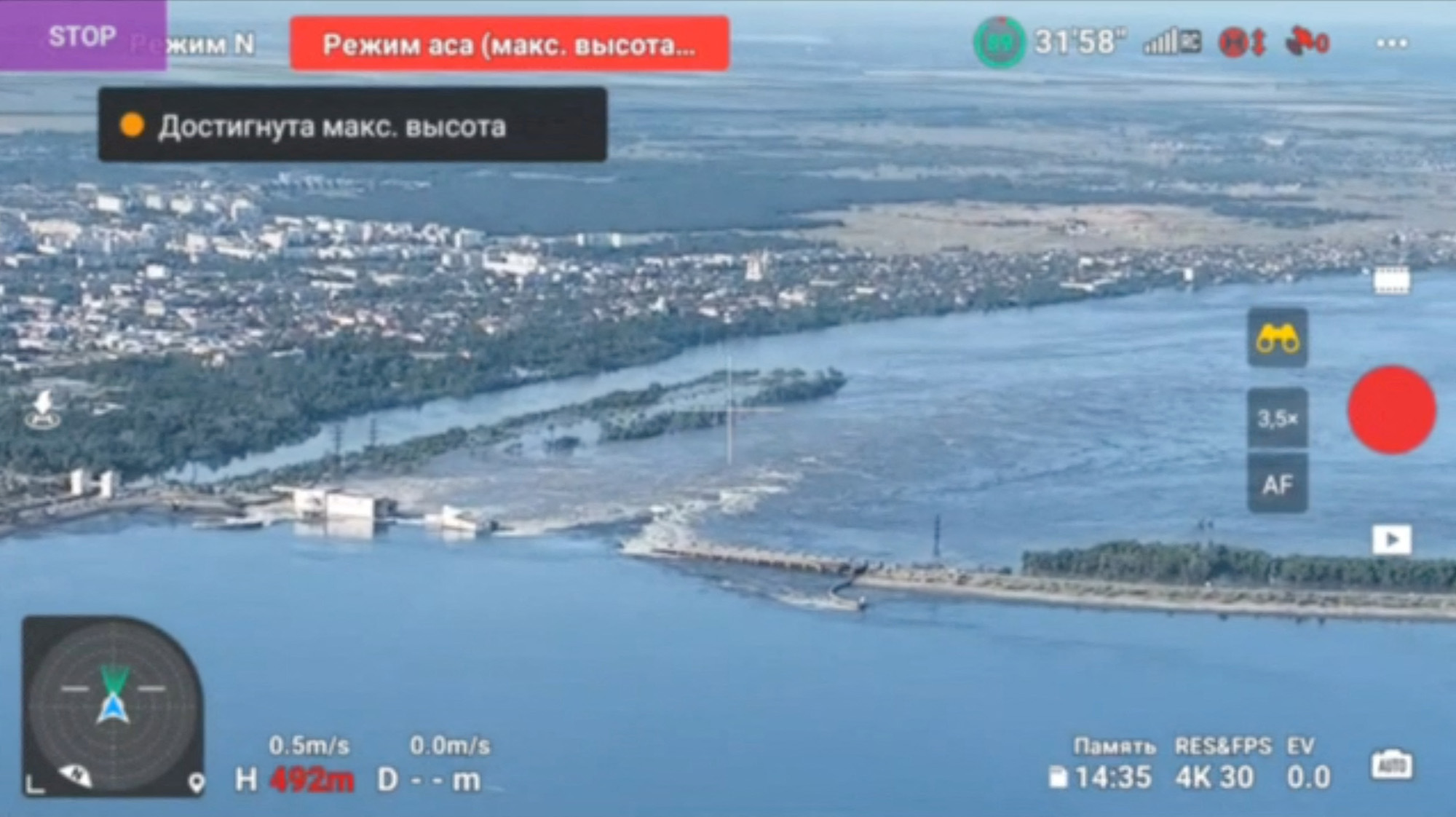 A view of the Nova Kakhovka dam that was breached in Kherson region, Ukraine, on June 6, in this screen grab taken from a video.