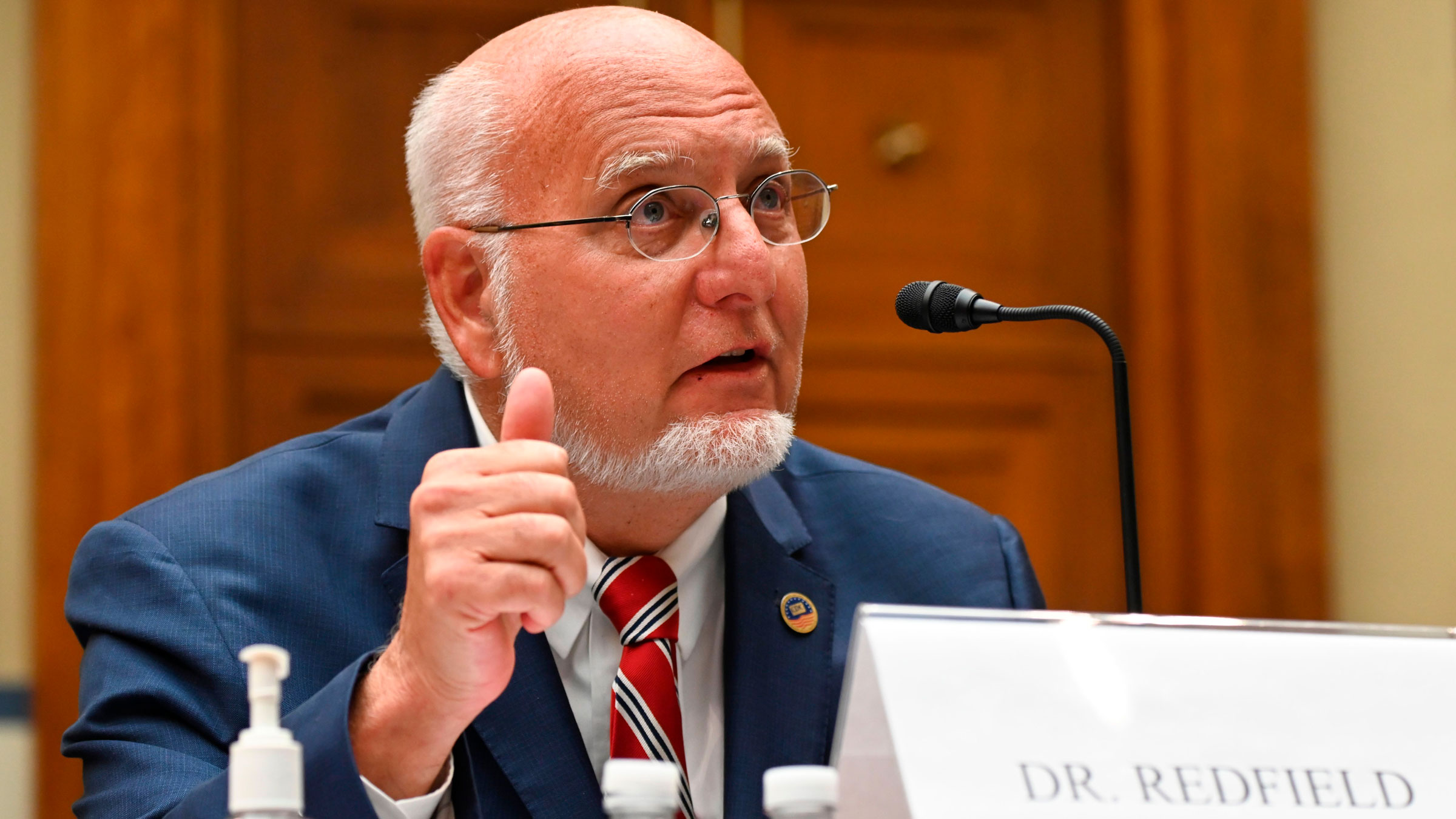 Dr. Robert Redfield, director of the Centers for Disease Control and Prevention, speaks to a House subcommittee in July.