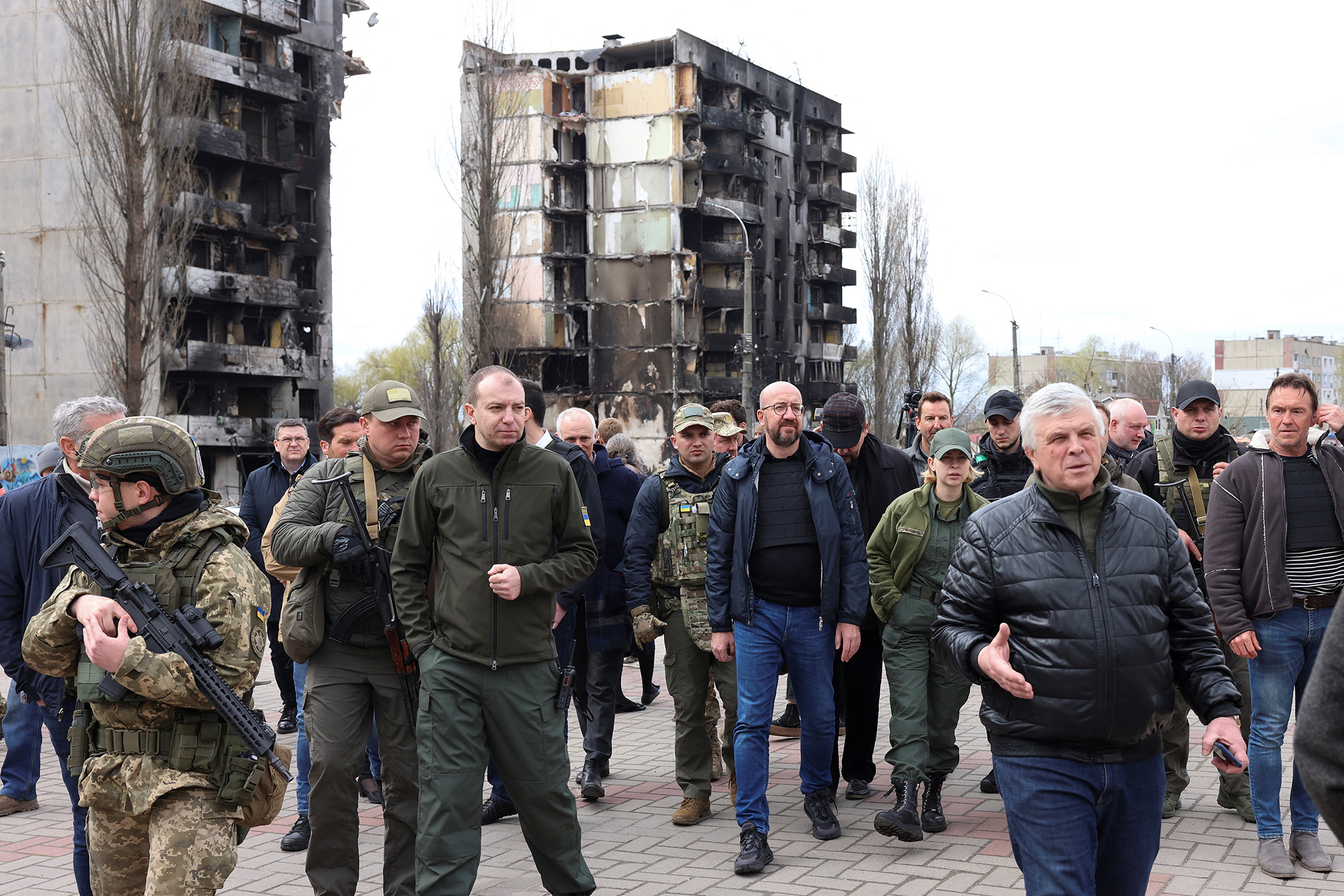 European Council President Charles Michel walks near damaged buildings in Borodyanka, Ukraine, on April 20.