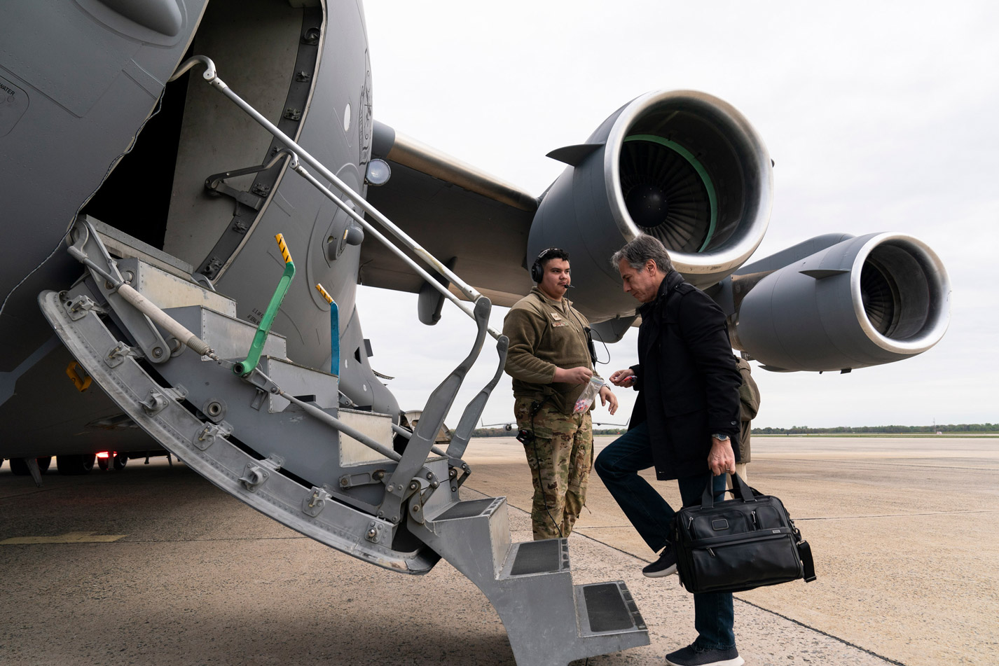 Secretary of State Antony Blinken boards a plane for departure, Saturday, April 23, at Andrews Air Force Base, Md.