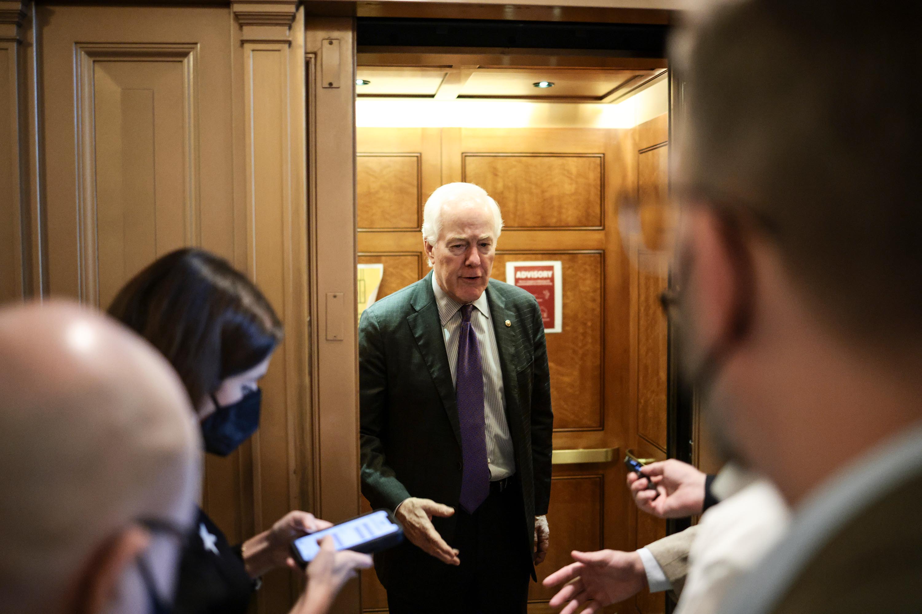 Sen. John Cornyn speaks to reporters outside the Senate Chambers on Wednesday, October 6, in Washington, DC. 