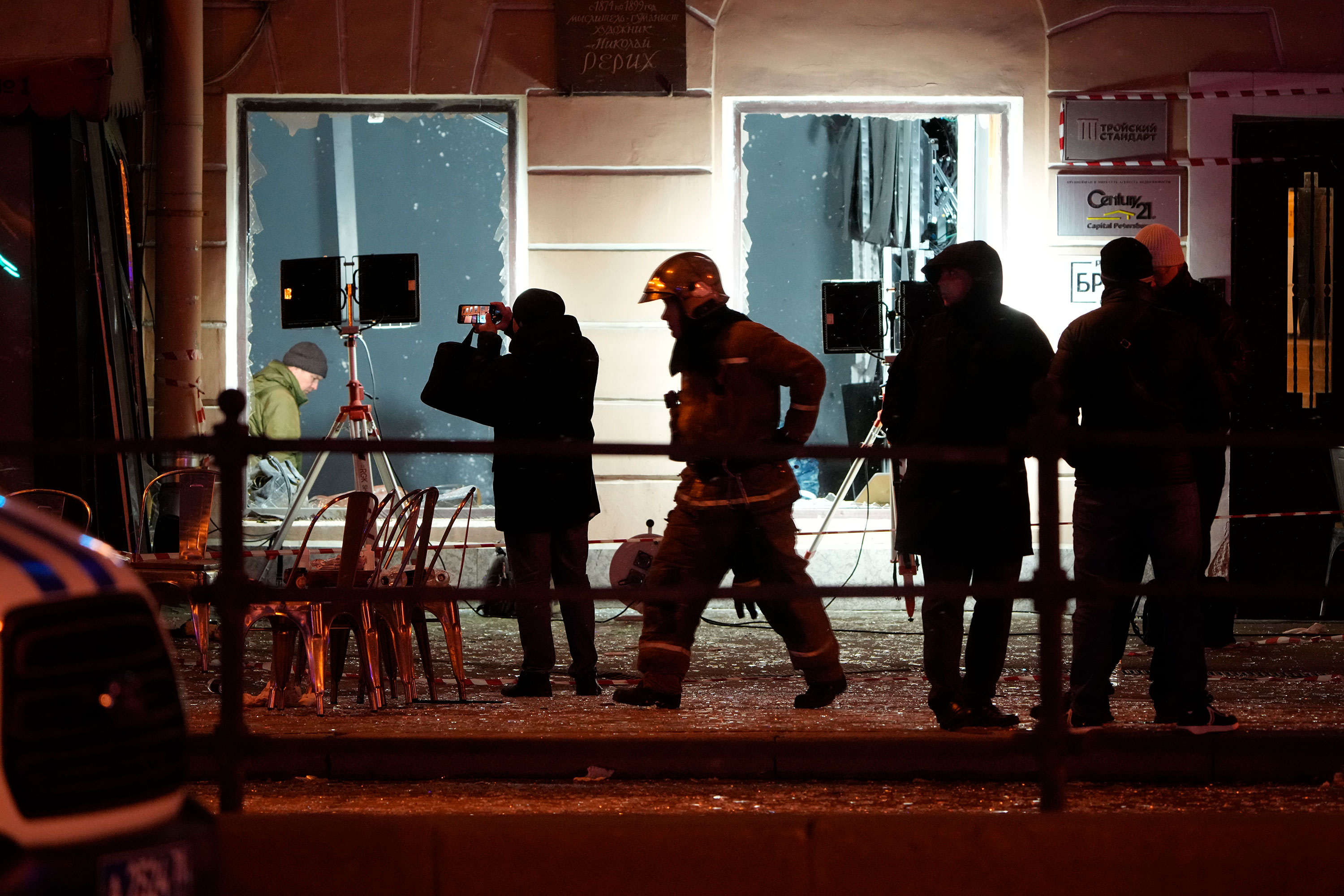 Investigators work at the site of an explosion at a cafe in St. Petersburg on April 2. 
