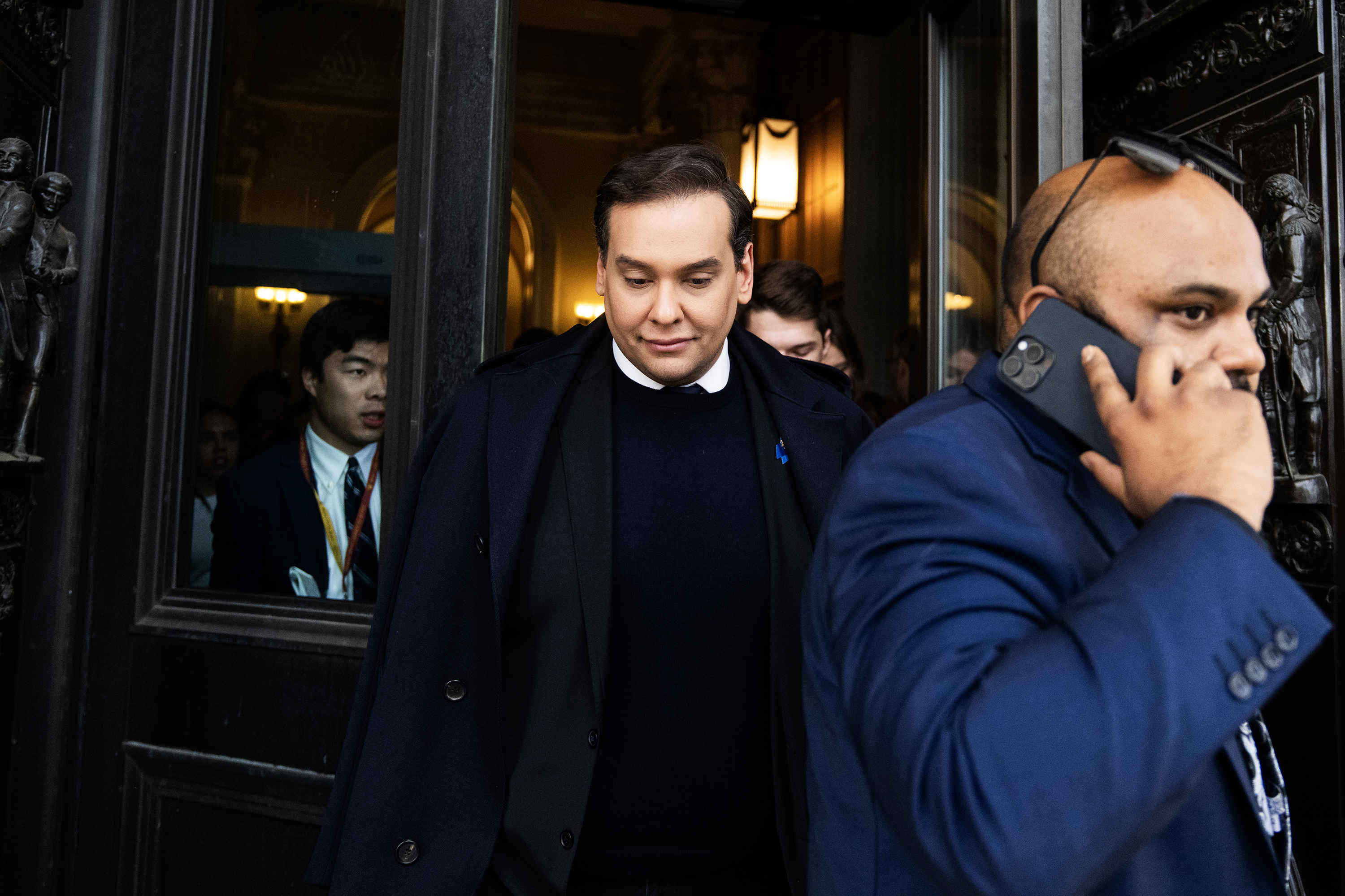 Rep. George Santos leaves the U.S. Capitol after the House voted to expel him from Congress on December 1.