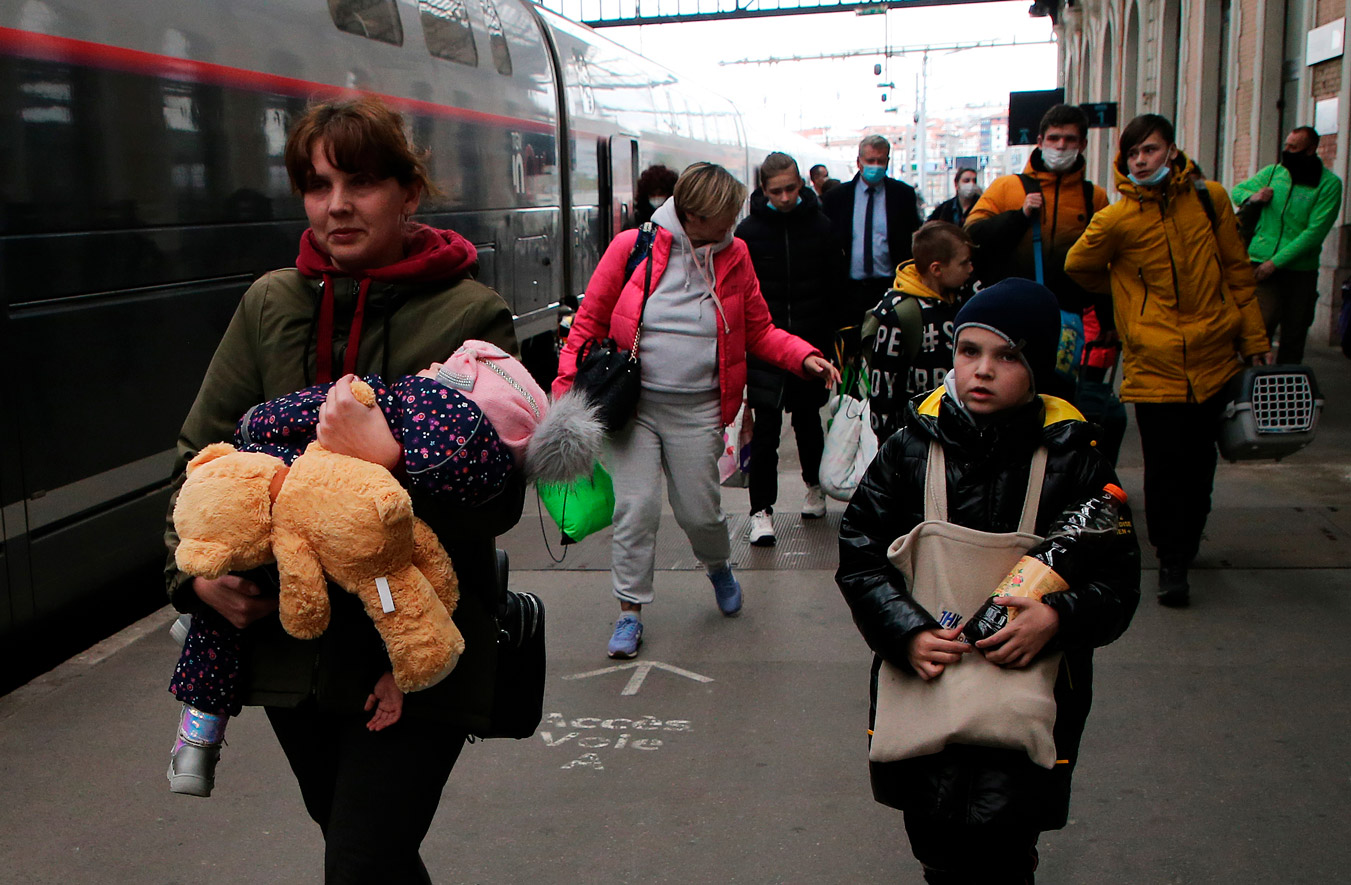 Ukrainian refugees arrive at Hendaye train station, southwestern France on Wednesday.