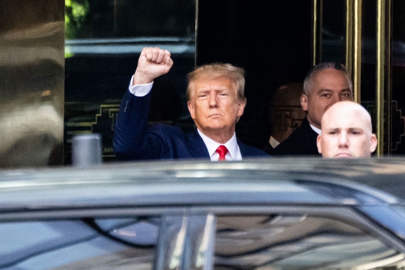 Trump leaves Trump Tower in New York before heading to the courthouse on Tuesday.