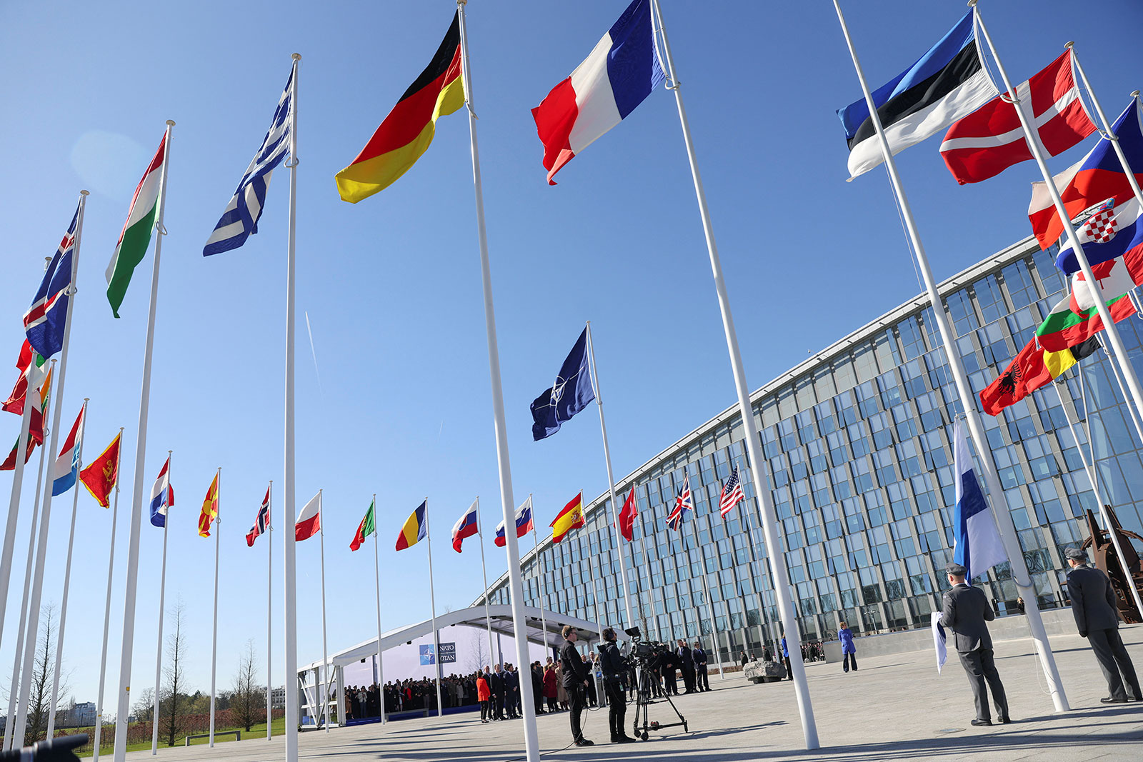 Flags flutter outside the NATO headquarters��in Brussels, Belgium, on April 4