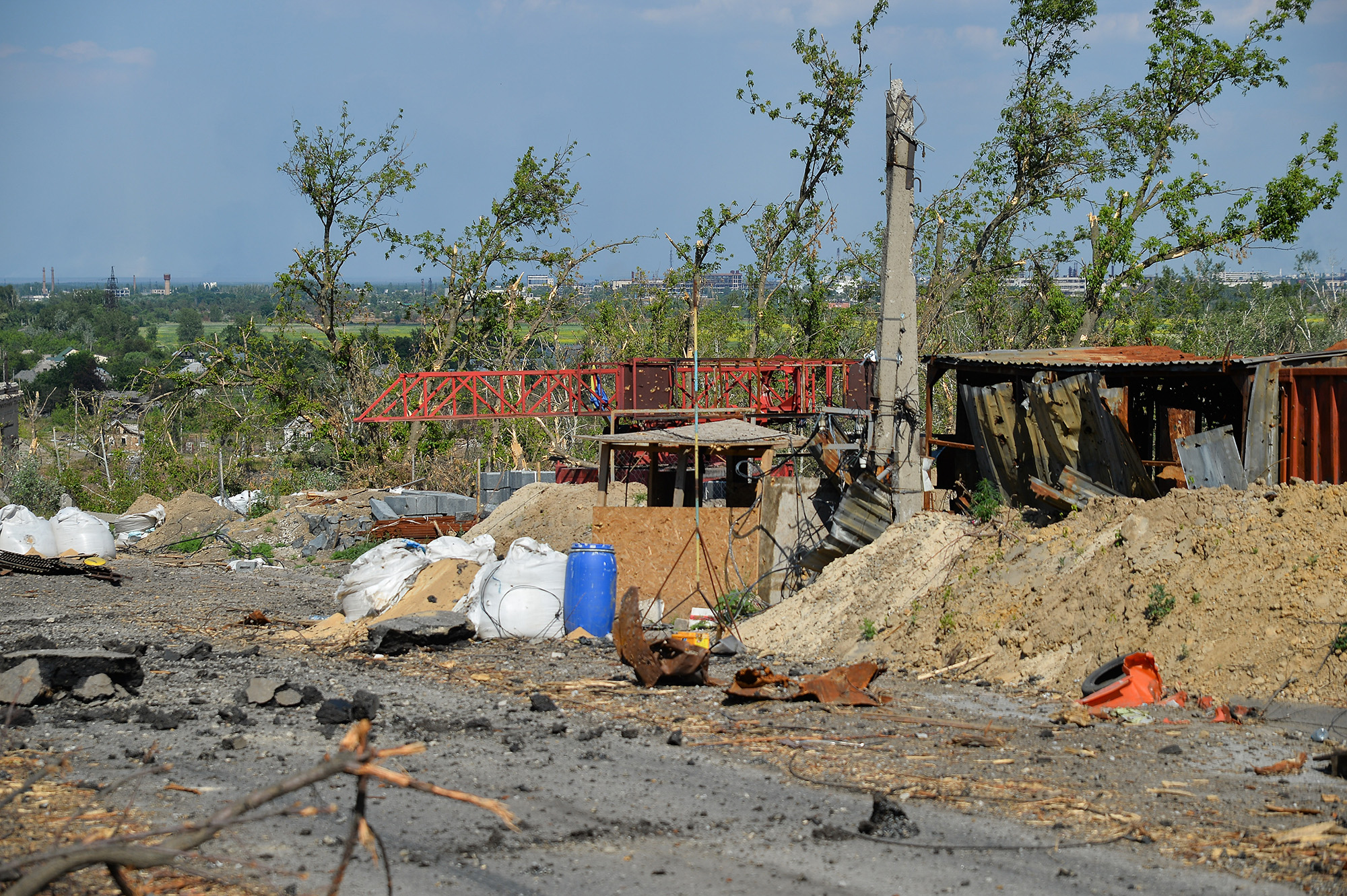 A bridge that travels from Lysychansk to Severodonetsk in eastern Ukraine is seen nearly destroyed on June 19.