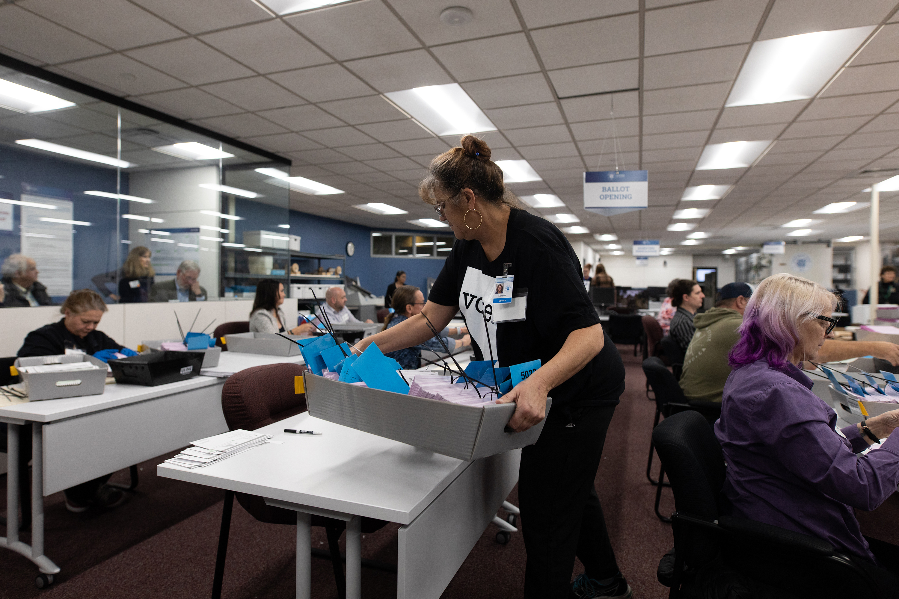 Election officials sort mail-in ballots at the Washoe County Voter Registration Office in Reno, Nevada, on Nov. 8.