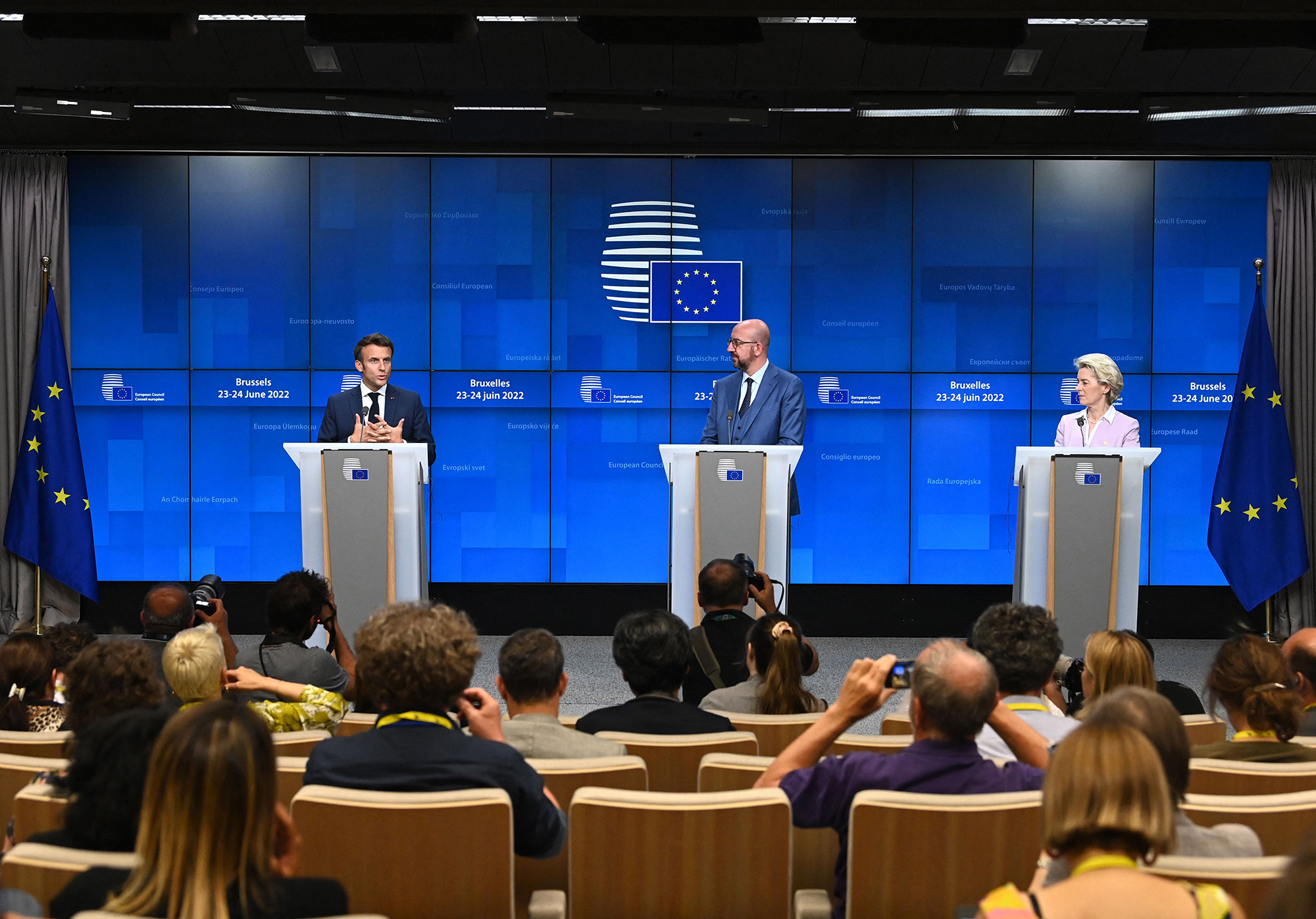 France's President Emmanuel Macron, left, President of the European Council Charles Michel, center and President of the European Commission Ursula von der Leyen, right, attend a press conference after a European Council meeting where they granted Ukraine and Moldova EU candidacy status in Brussels, Belgium, on June 23.