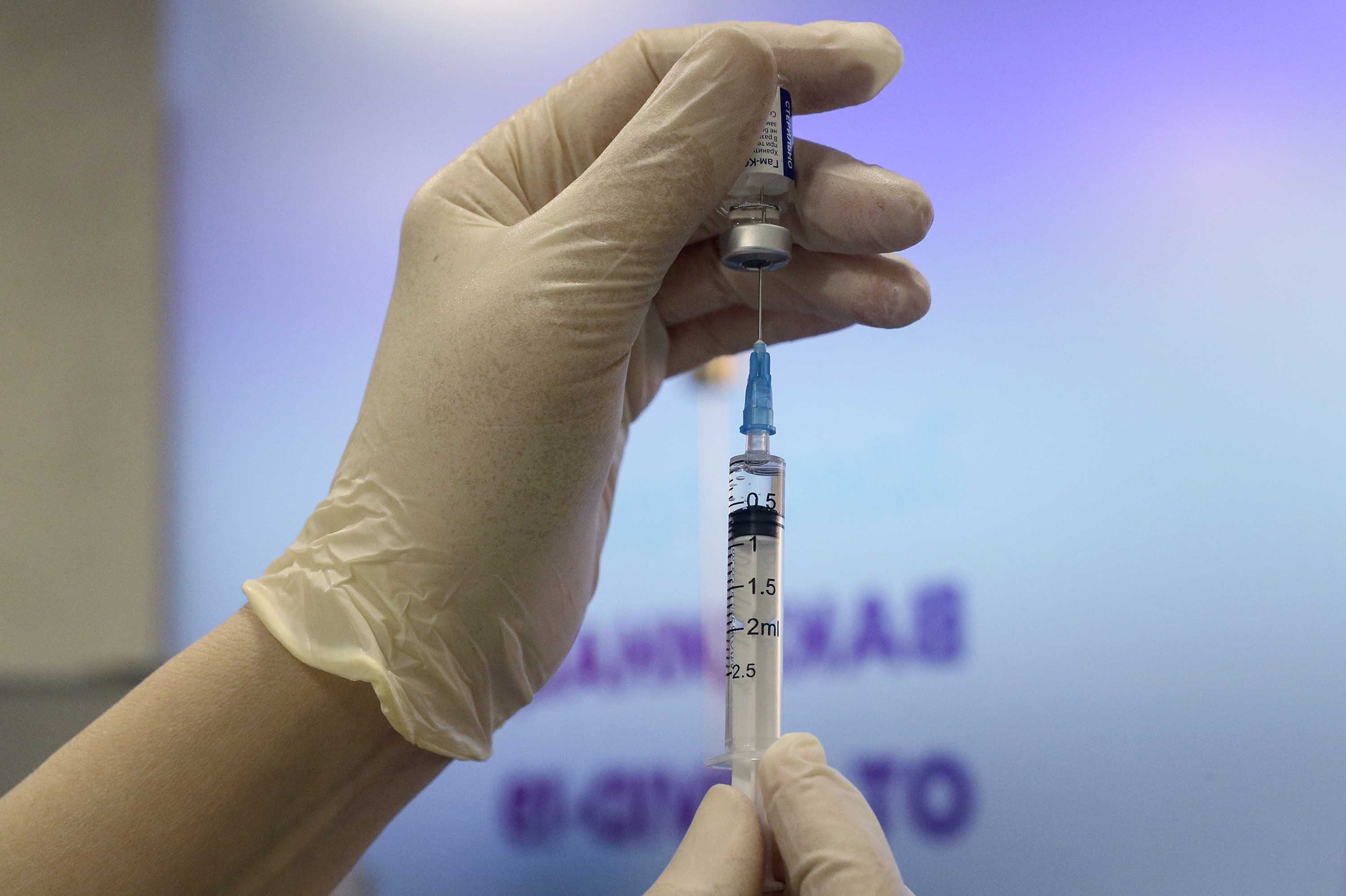 A medical worker fills a syringe with the Sputnik V vaccine at a vaccination site in Moscow on March 3. 