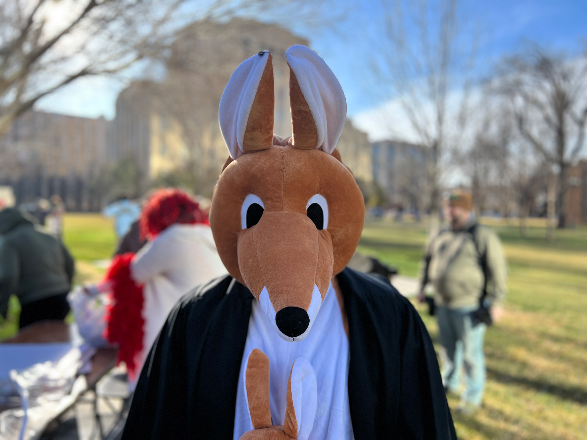 A man dressed in a plush Kangaroo judge outfit stands outside a Texas court during a hearing on medical abortion in Amarillo, Texas.
