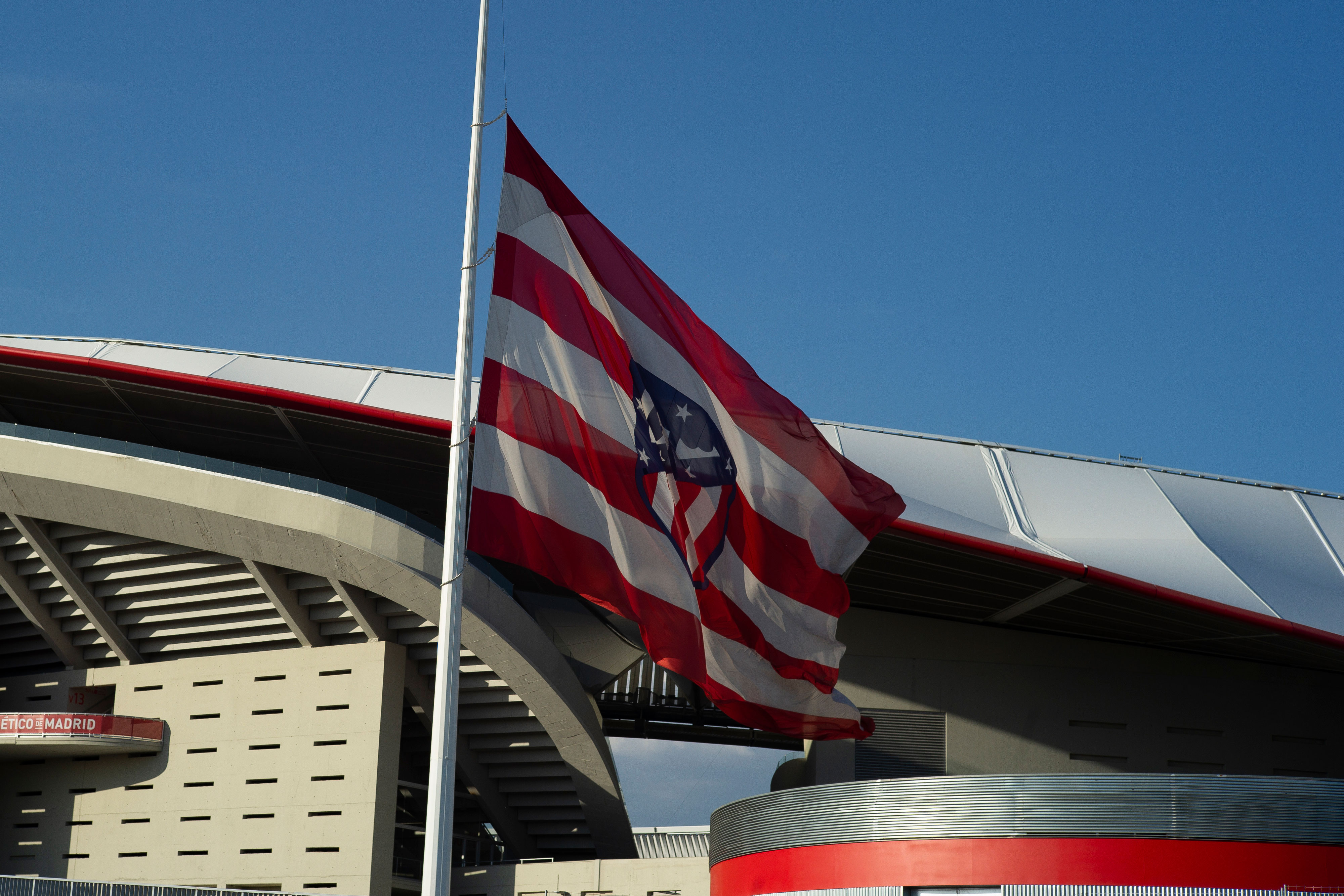 The Atlético Madrid flag flies at half-staff in memory of Covid-19 victims at the Wanda Metropolitano Stadium in Madrid on June 2, 2020.