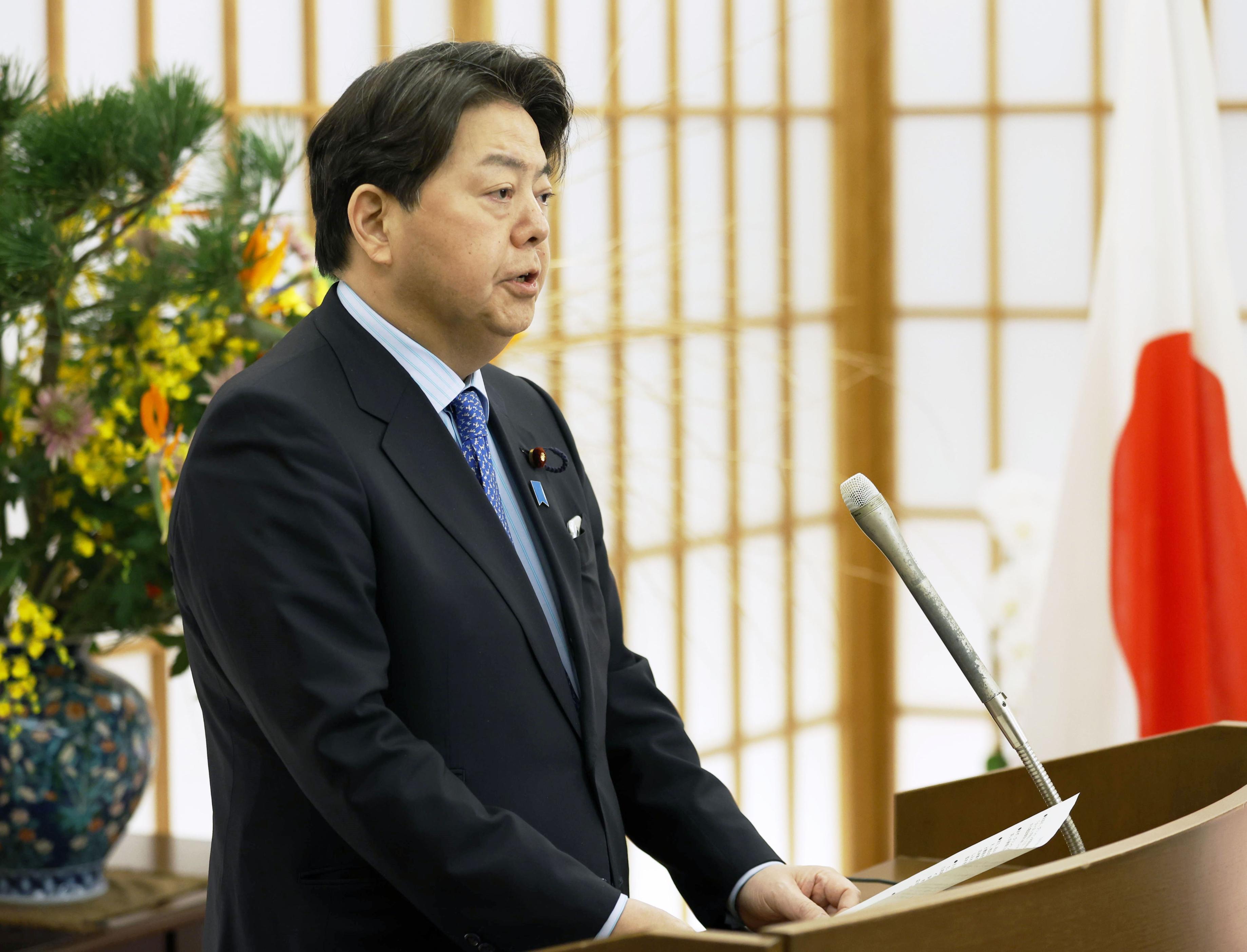 Japanese Foreign Minister Yoshimasa Hayashi meets the press in Tokyo on Jan. 6, 2022, after asking U.S. Secretary of State Antony Blinken in phone talks to impose curfews on U.S. bases in Japan due to a recent surge of coronavirus infections among American military personnel. 