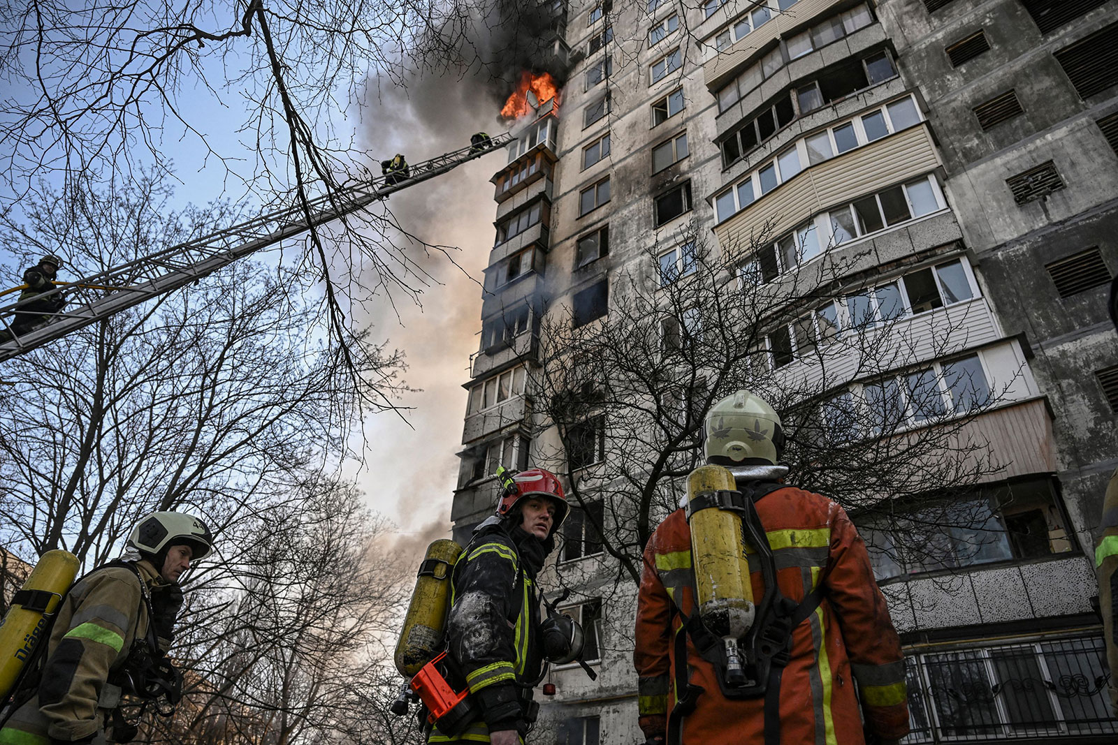 Firefighters work to extinguish a fire in an apartment building damaged by shelling in Kyiv, Ukraine, on March 15. 