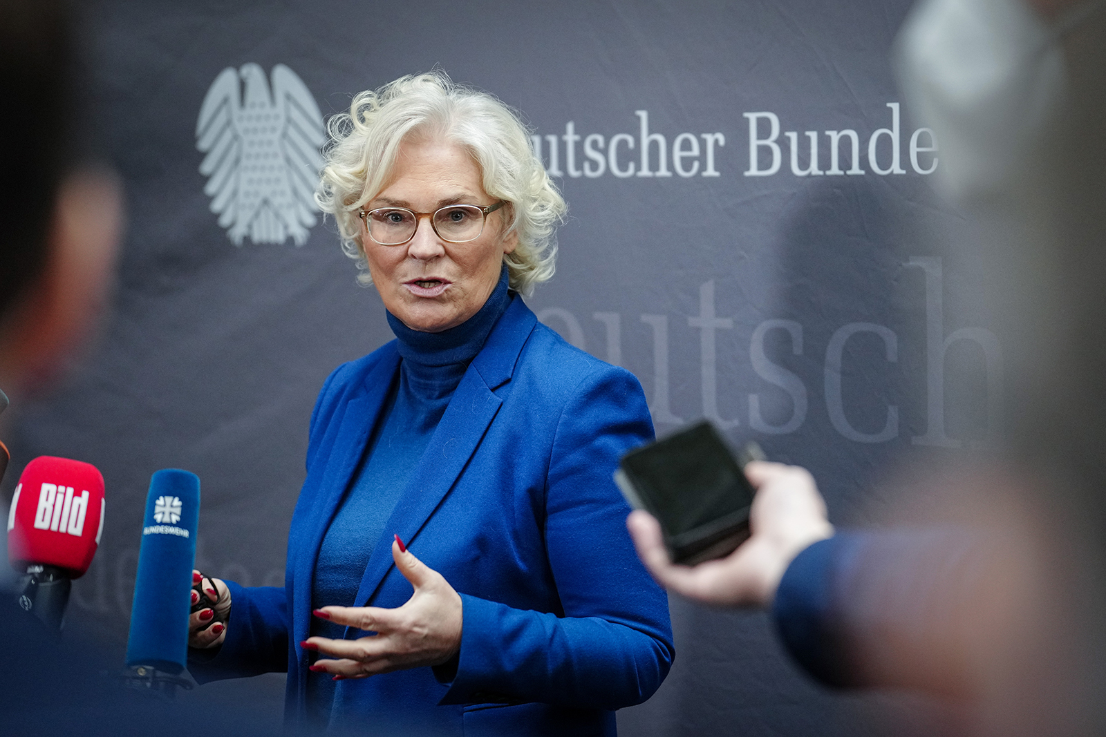 Christine Lambrecht (SPD), Federal Minister of Defense, speaks to media representatives after the special session of the Defense Committee in the Bundestag, Berlin, Germany on February 24.