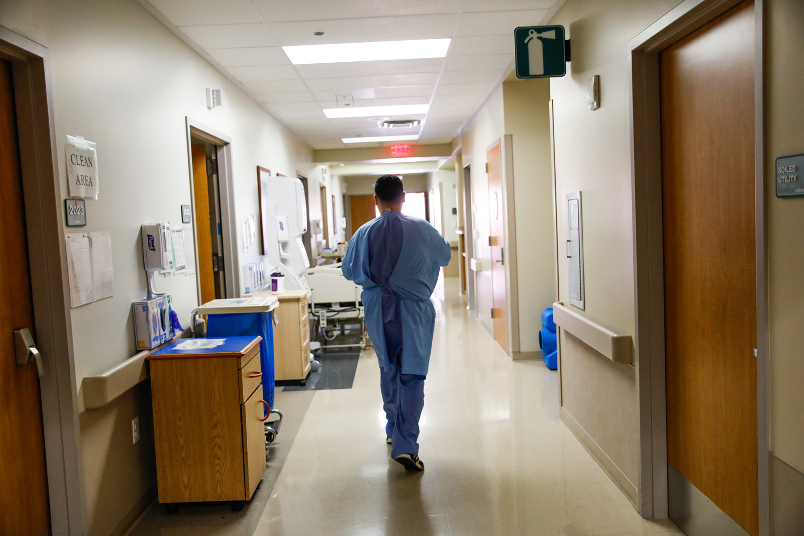 A nurse walks down the hall as he treats Covid-19 patients at Regional Medical Center of San Jose, an acute-care hospital, in San Jose, California, on December 8.