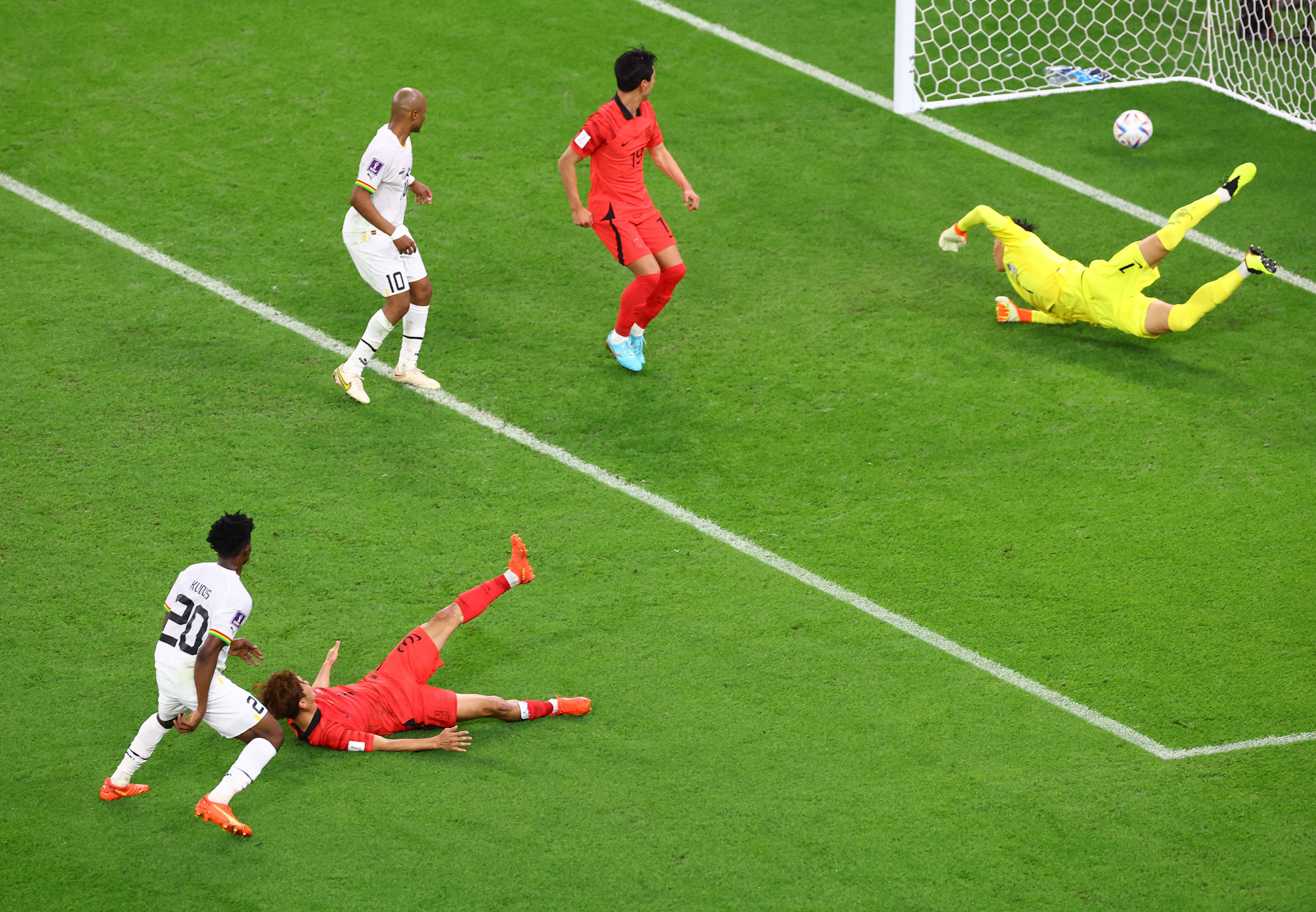 Mohammed Kudus, bottom left, scores Ghana's third goal against South Korea.
