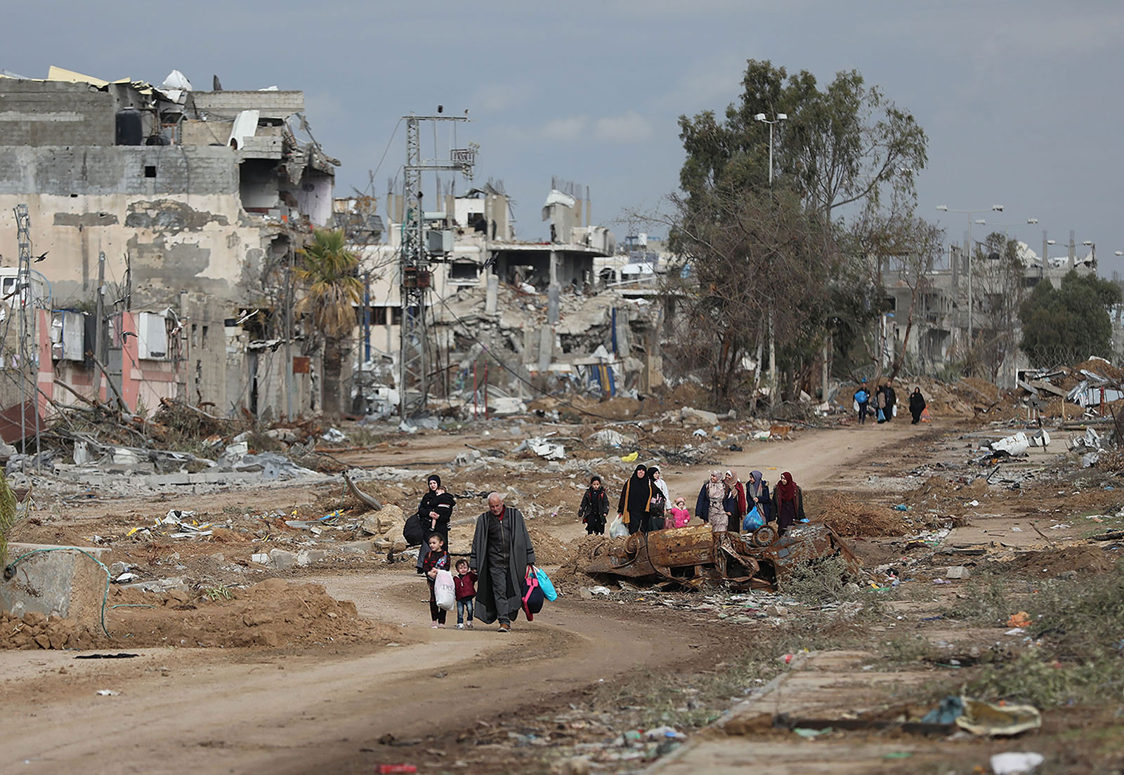 Displaced people move toward the southern part of Gaza in Gaza City, on Tuesday, November 28.