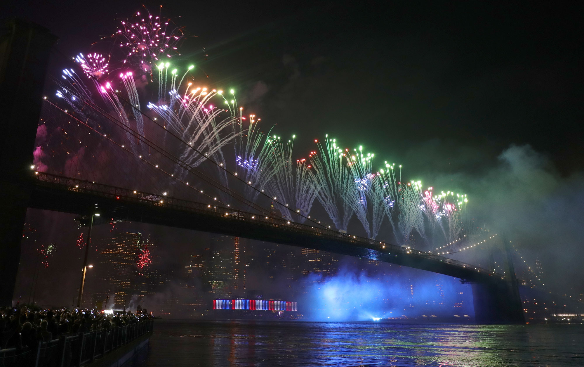 Fireworks are launched from the Brooklyn Bridge during Macy's Independence Day fireworks show on July 4, 2019 in New York City. 
