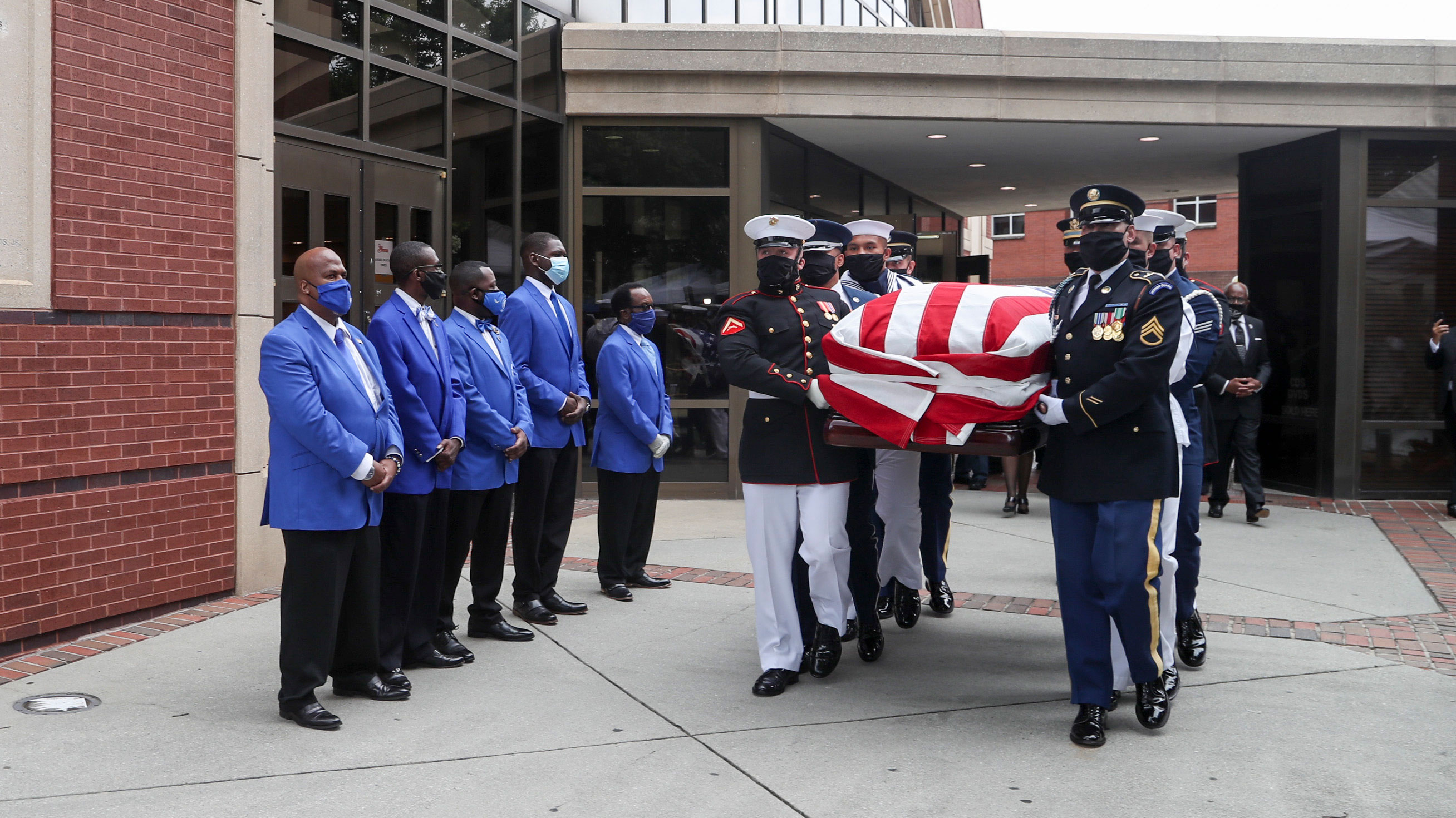Pallbearers carry the body of Rep. John Lewis after funeral services at Ebenezer Baptist Church on July 30 in Atlanta.