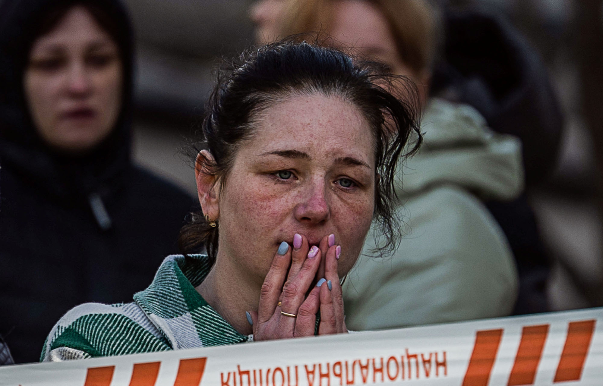 A local resident reacts near the site of a heavily damaged residential building hit by a Russian missile in the town of Uman, Cherkasy region, Ukraine, on April 28.