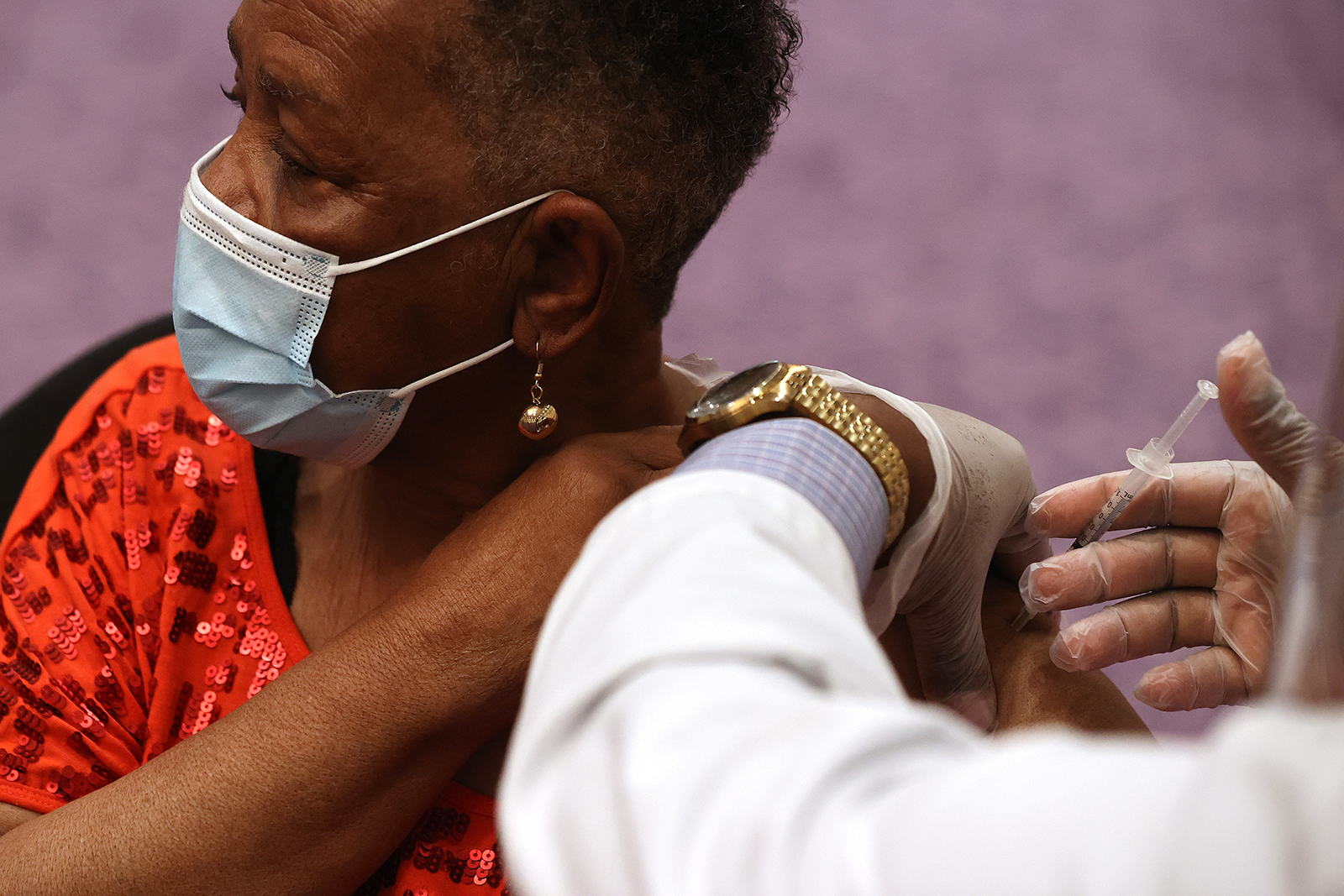 Blonnie Nichols gets her first does of the Moderna COVID-19 vaccine at First Baptist Church of Highland Park in Landover, Maryland, on March 18.