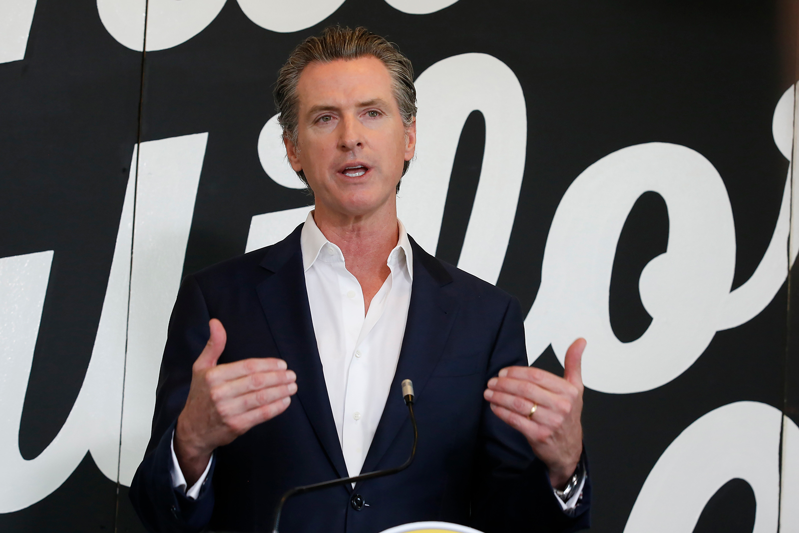 Gov. Gavin Newsom discusses his plan for the gradual reopening of California businesses during a news conference at the Display California store in Sacramento, California on Tuesday, May 5.