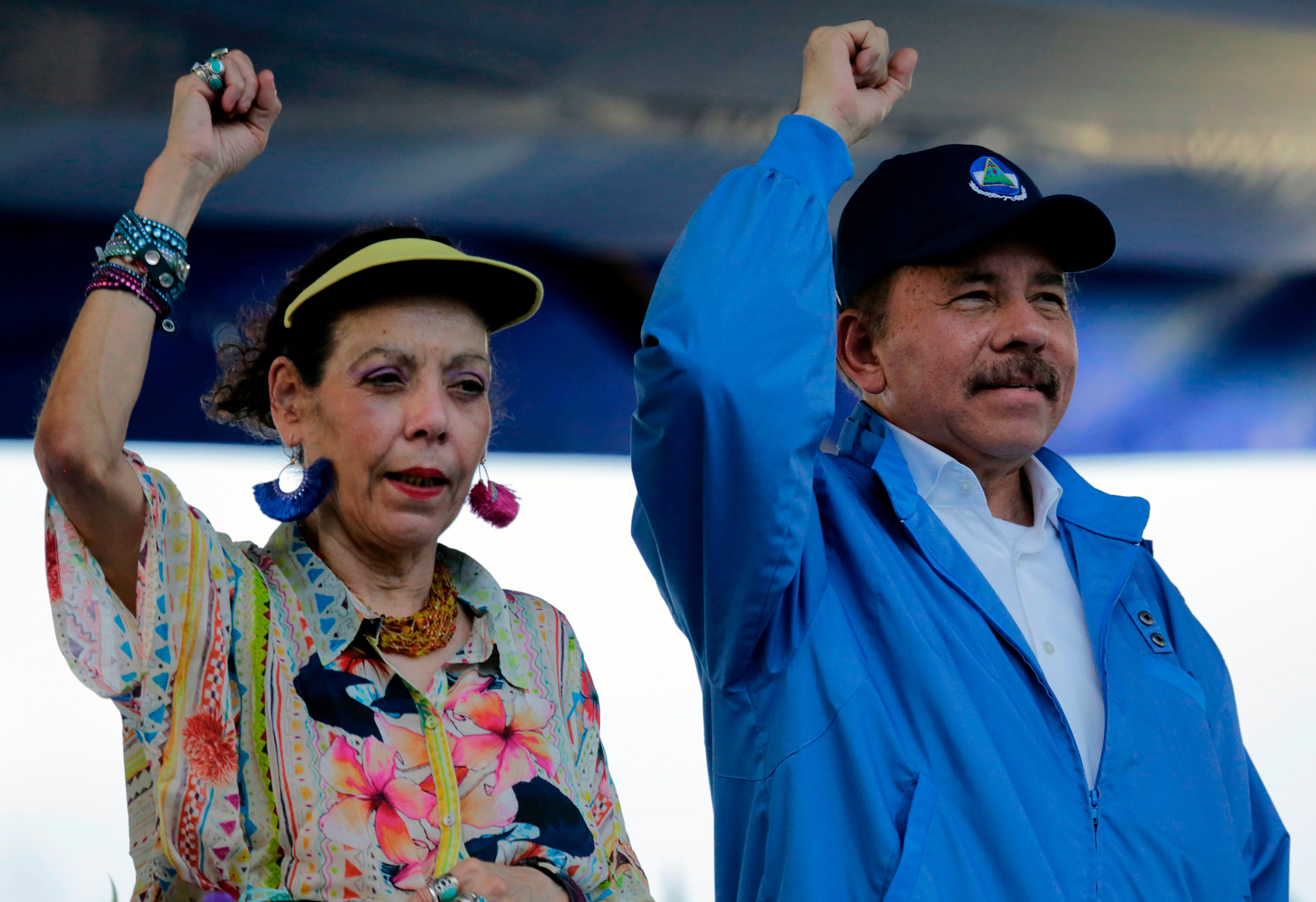 Nicaraguan President Daniel Ortega and his wife, Vice President Rosario Murillo, attend an event in Managua, on August 29, 2018. 