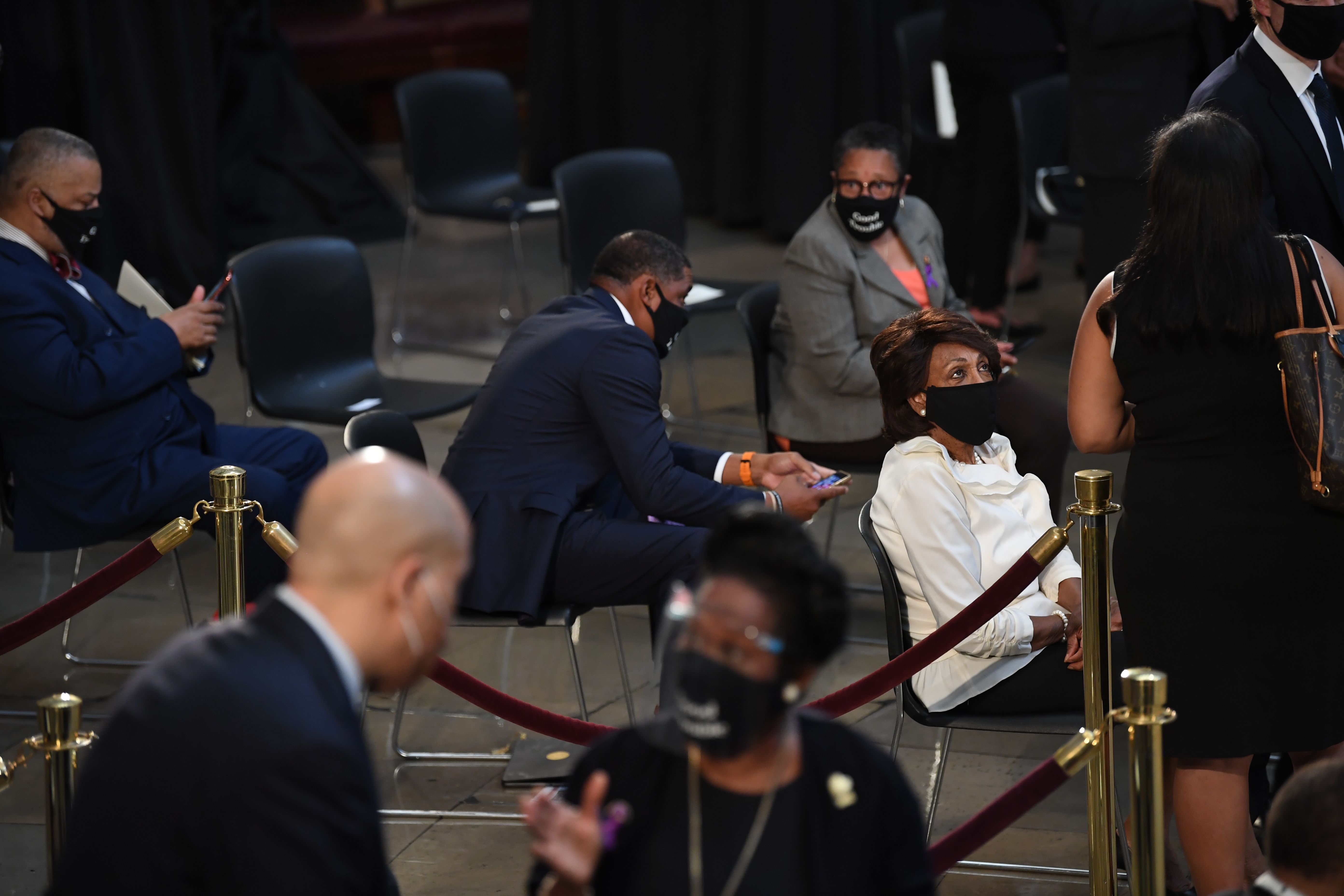 California Rep. Maxine Waters waits prior to the start of the ceremony preceding the lying in state of Rep. John Lewis in the Rotunda of the US Capitol in Washington, DC.