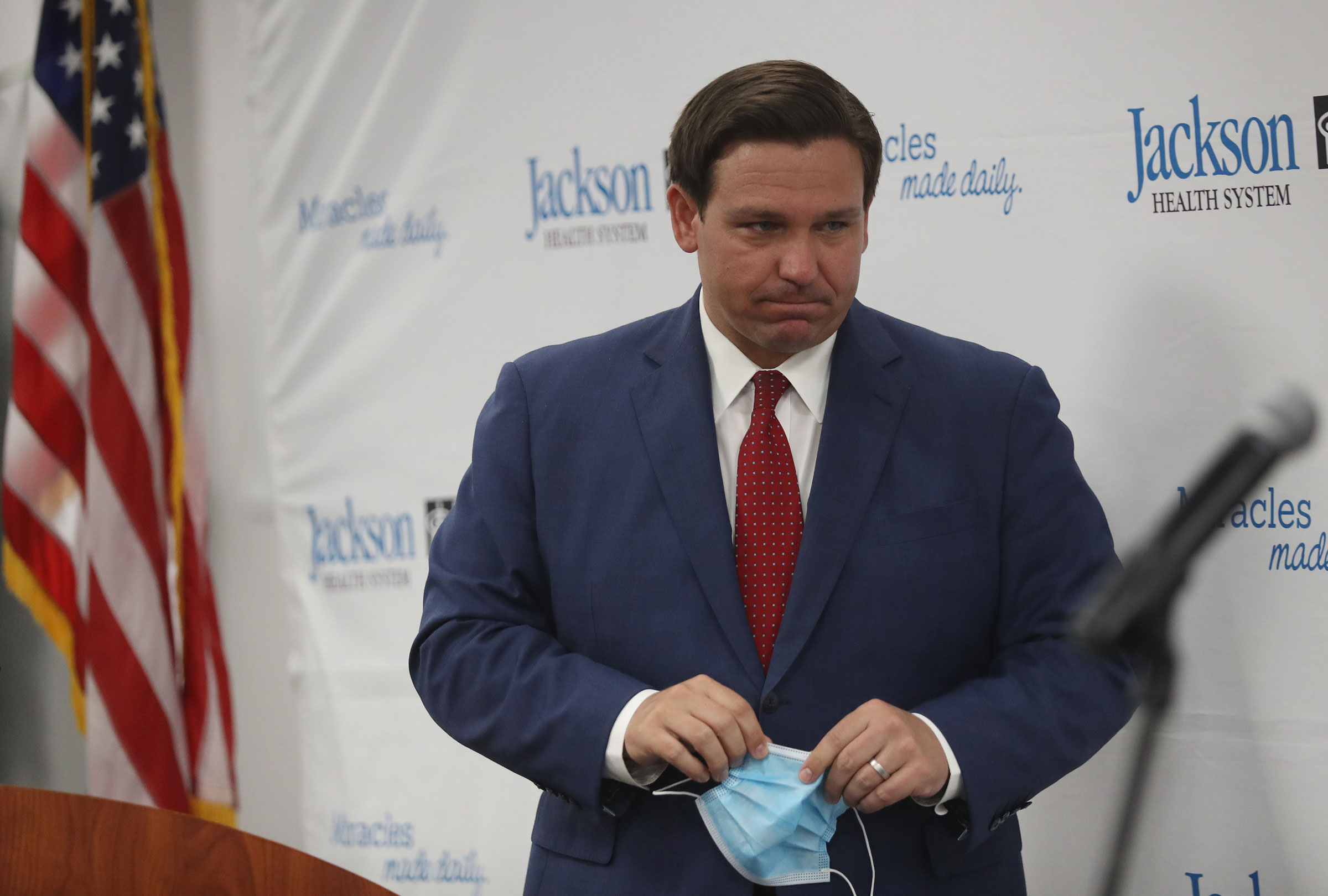 Florida Gov. Ron DeSantis leaves a news conference in Miami on July 13.