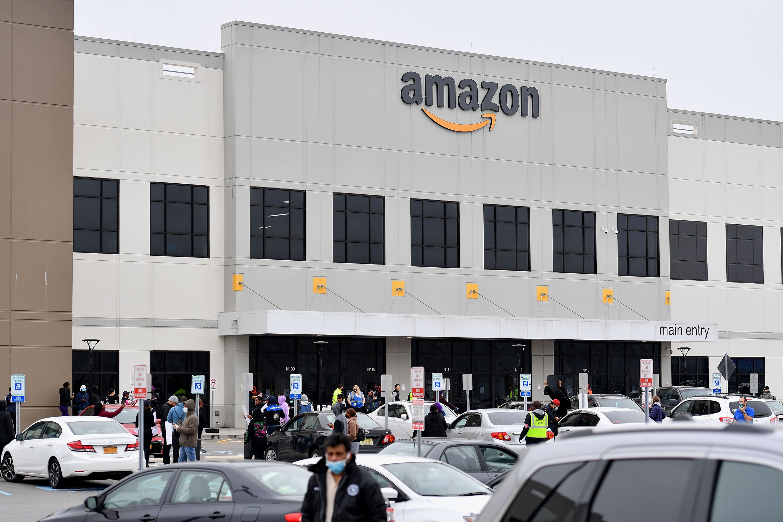 Workers at Amazon's Staten Island warehouse hold a strike on March 30 in New York. 