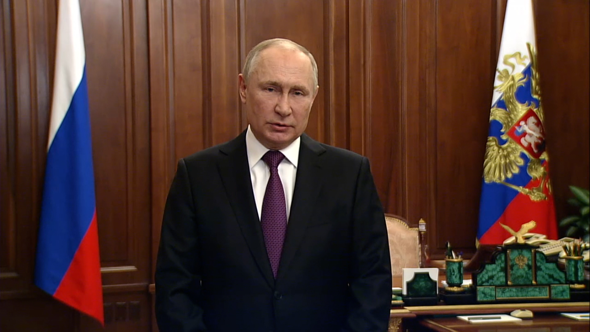 Russian President Vladimir Putin speaks in a video message released by the Kremlin on February 23.