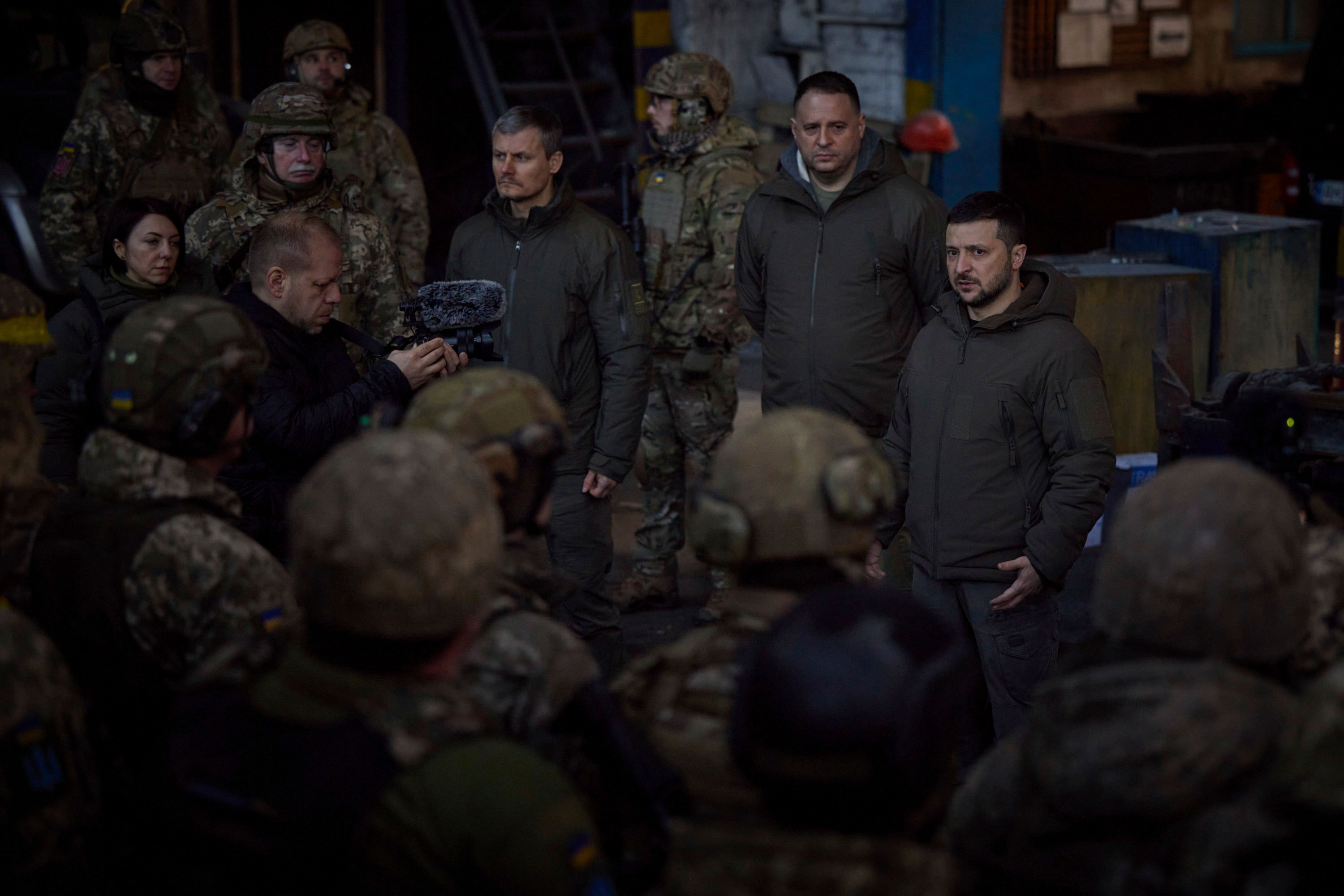 Ukrainian President Volodymyr Zelensky speaks to soldiers in Bakhmut, Ukraine, on Tuesday.